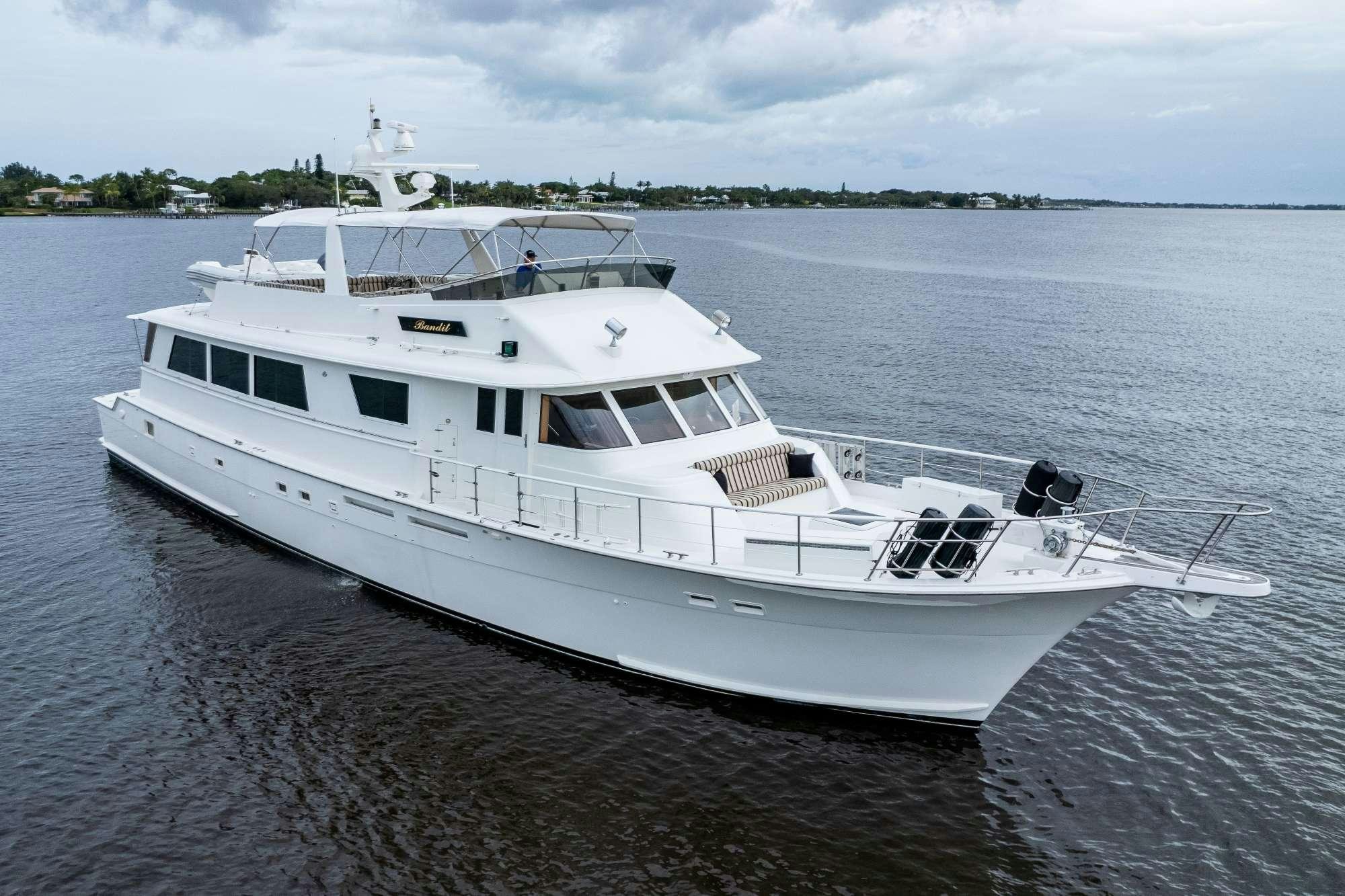a white boat on the water aboard BANDIT Yacht for Charter