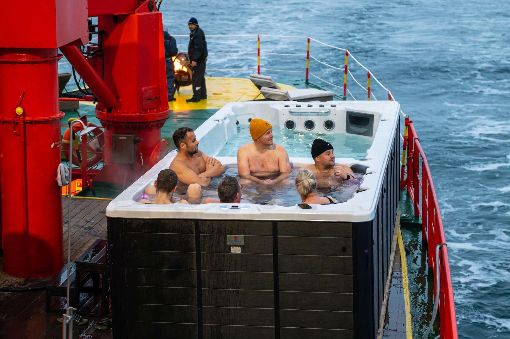 a group of people in a boat aboard ARGUS Yacht for Charter