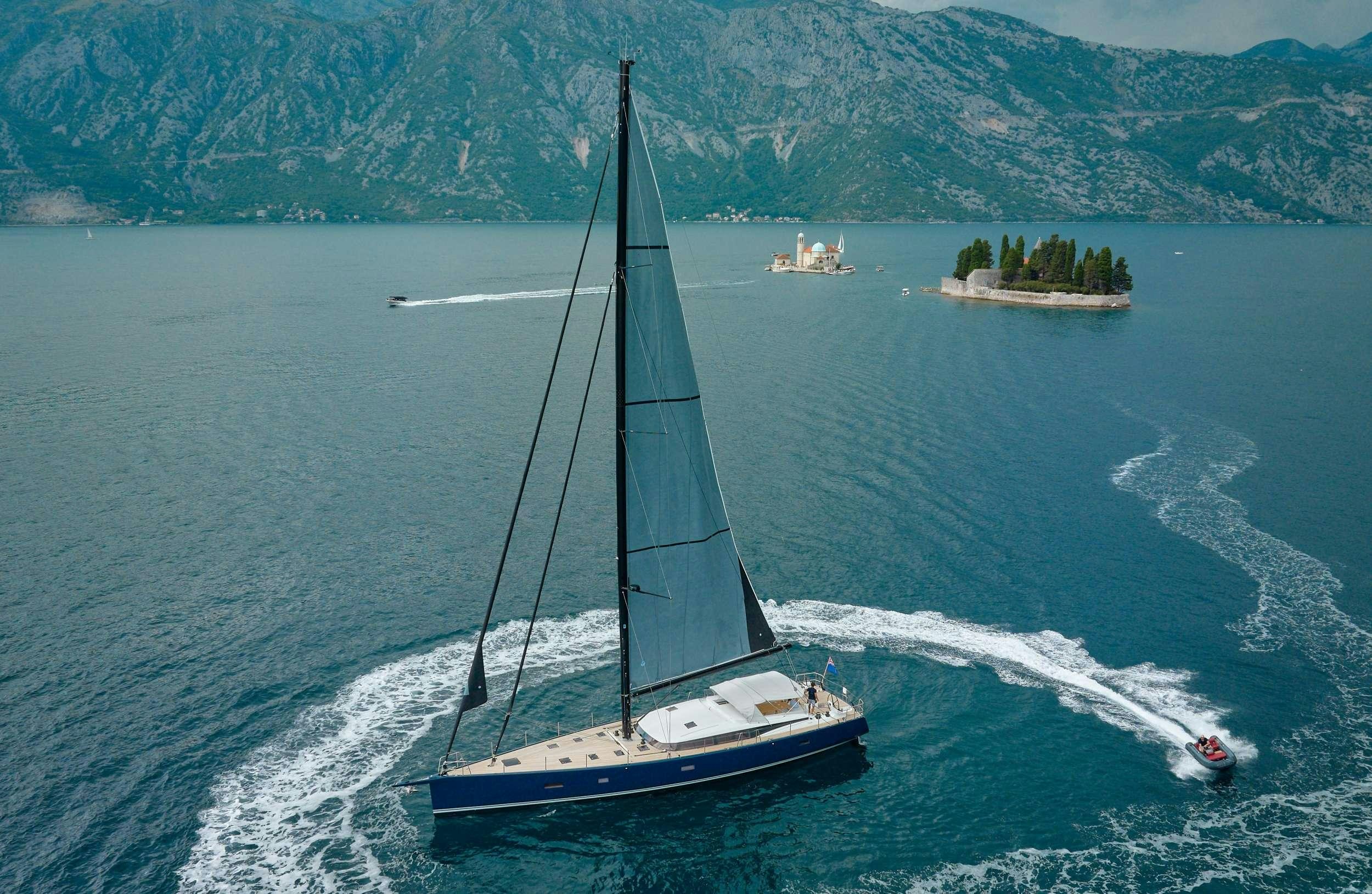 a boat sailing on the sea aboard GRATEFUL Yacht for Charter