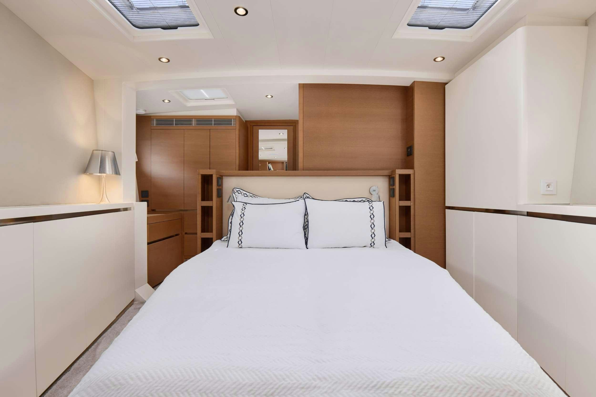 a bed in a room aboard GRATEFUL Yacht for Charter