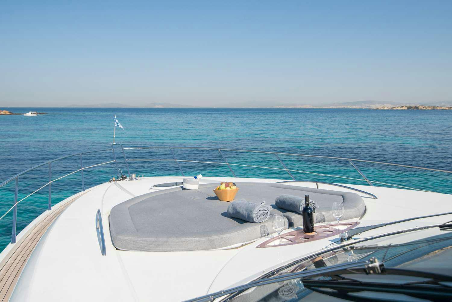 a boat with a fruit on the front aboard ELENTARI Yacht for Charter