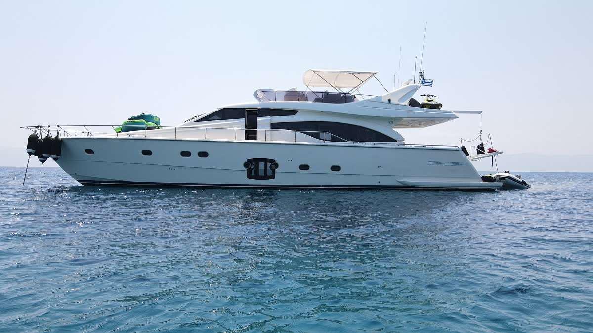 a white yacht in the water aboard FLOW Yacht for Charter