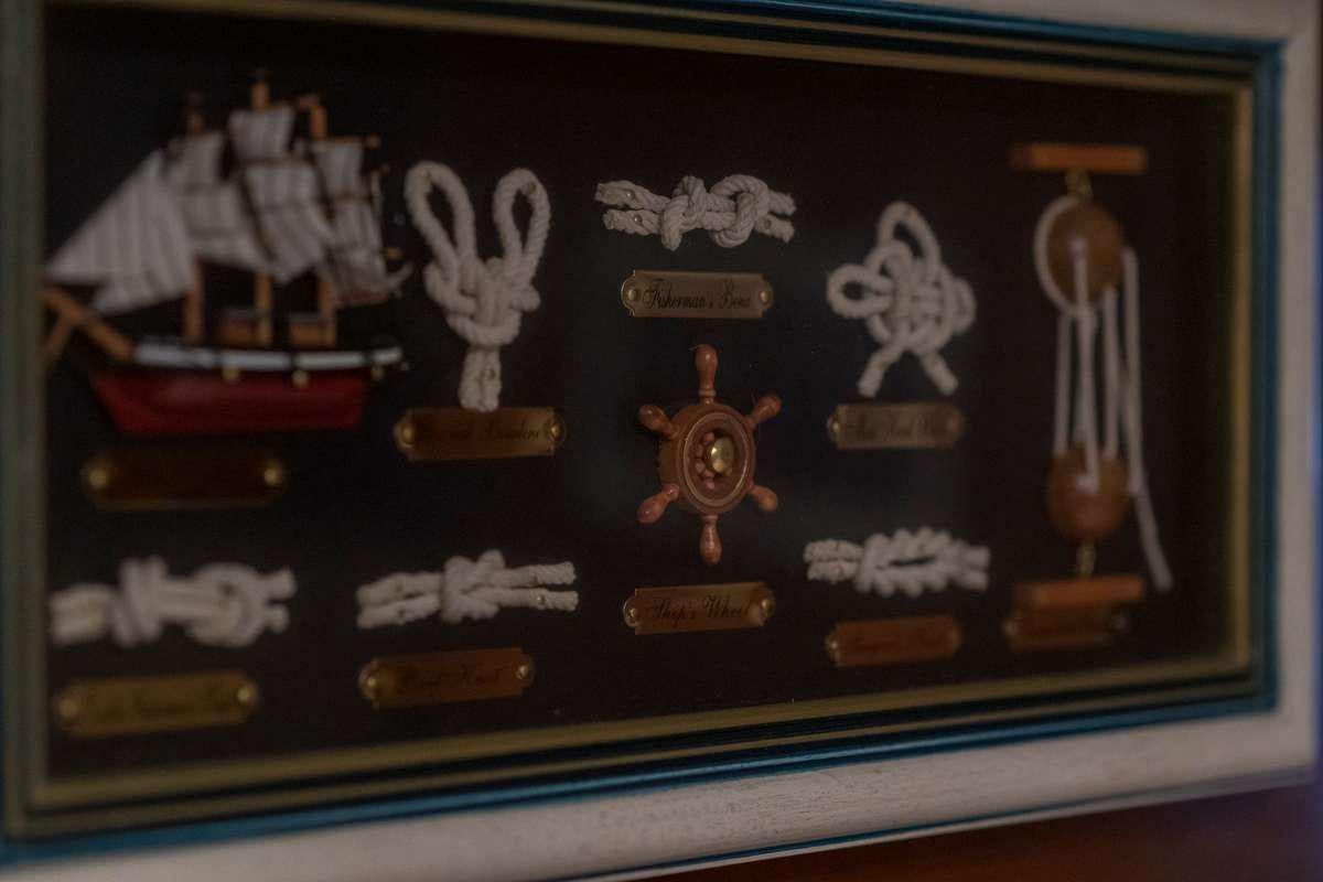 a display case with a variety of objects on it aboard P Yacht for Charter