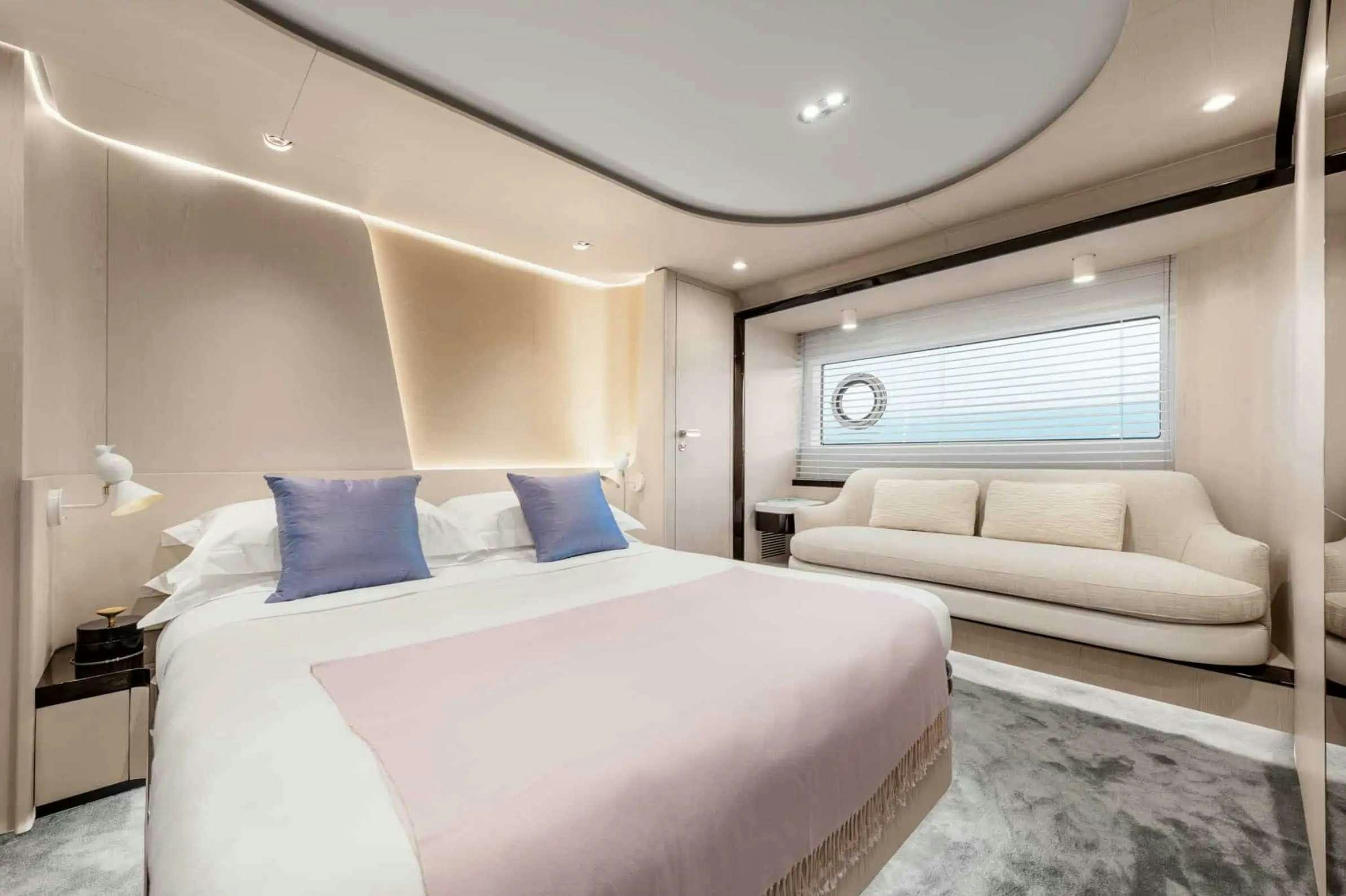 a bed in a room aboard PARADISE PEARL Yacht for Charter