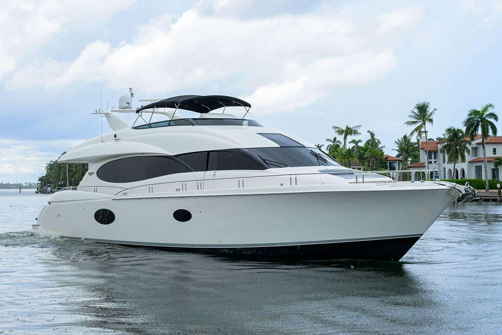 a white yacht on the water aboard LIVING THE DREAM Yacht for Charter