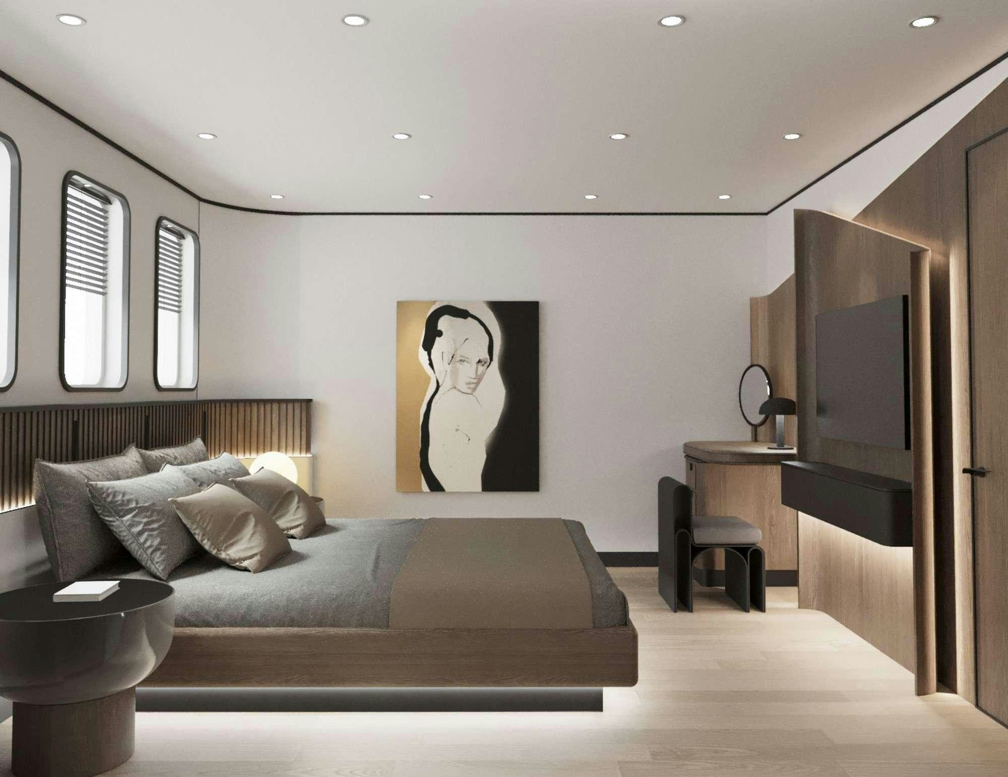 a bedroom with a bed and a television aboard DE LOVE Yacht for Charter