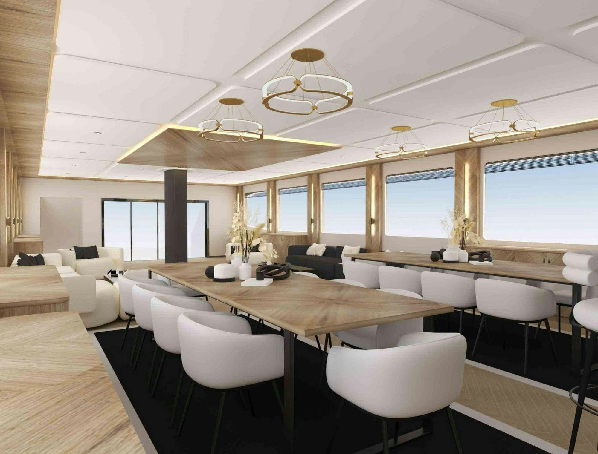 a room with tables and chairs aboard KING OF THE SEA Yacht for Charter