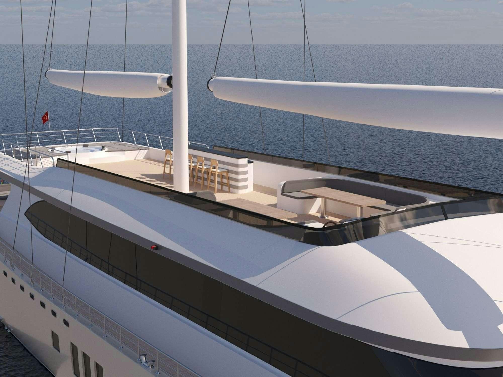 a large white boat with a large white sail on the water aboard KING OF THE SEA Yacht for Charter