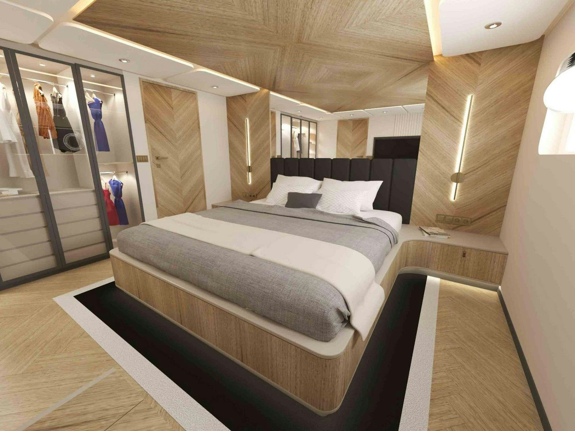 a bed in a room aboard KING OF THE SEA Yacht for Charter