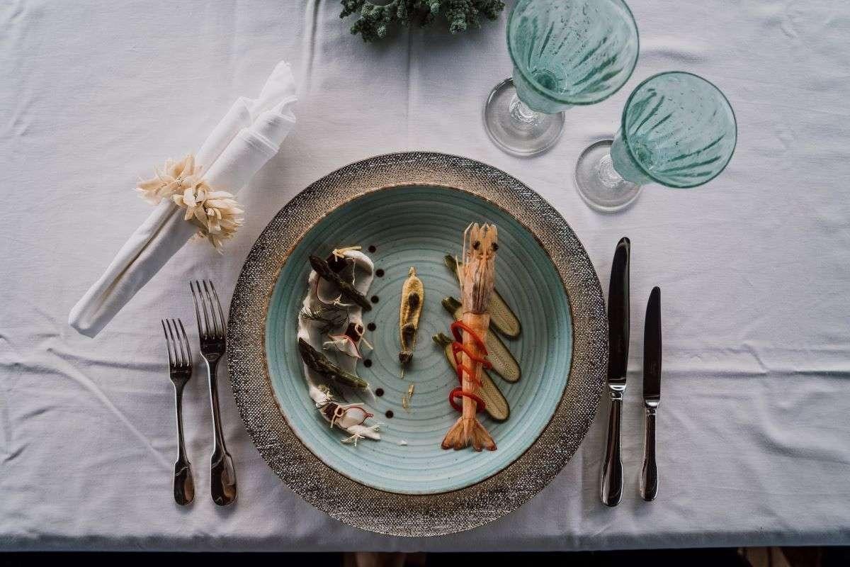 a plate with food on it aboard CAPRICORN ONE Yacht for Charter