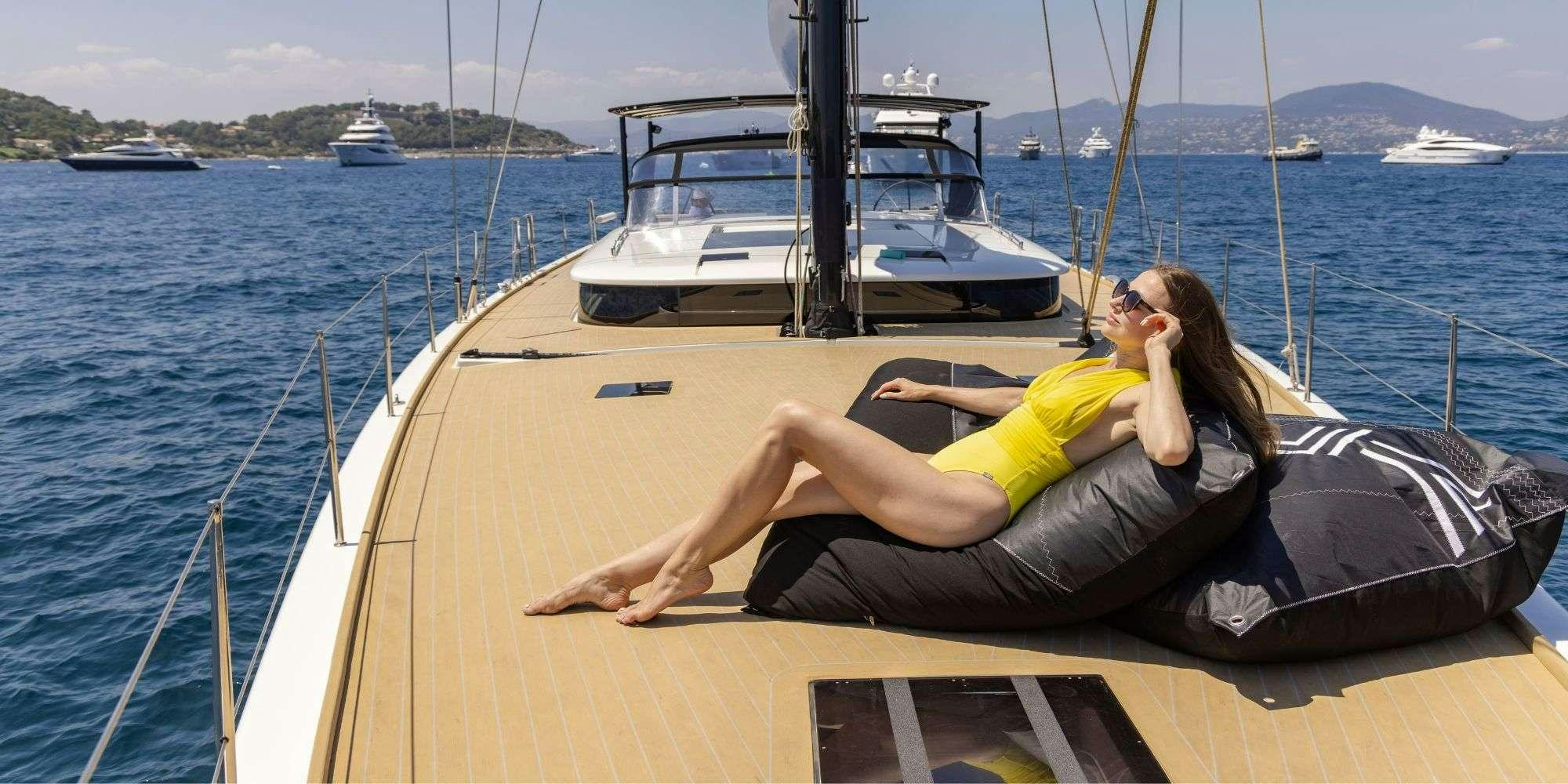 a person lying on a boat aboard MYSTIC Yacht for Charter