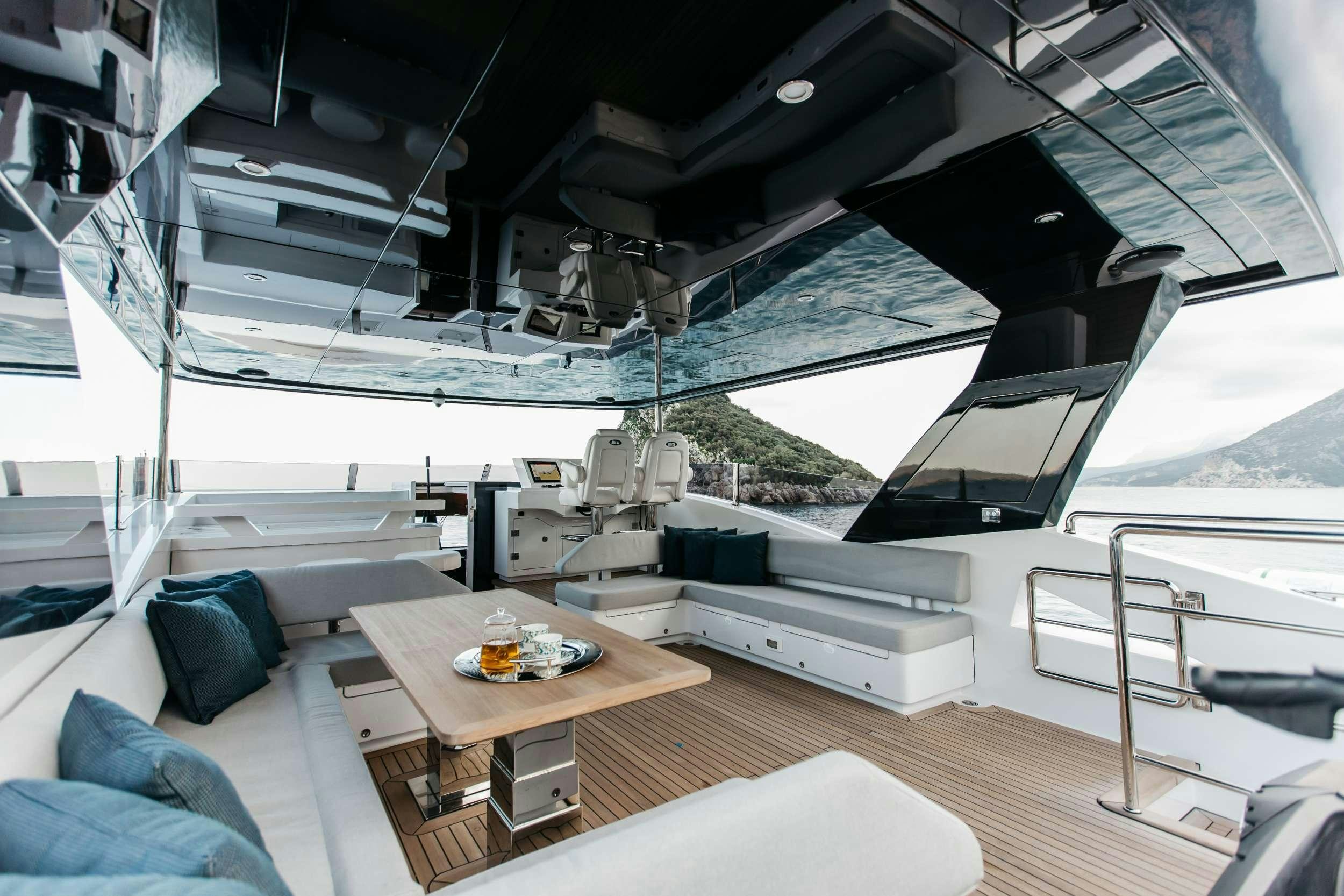 a room with a couch and a table aboard PAPILLON Yacht for Charter