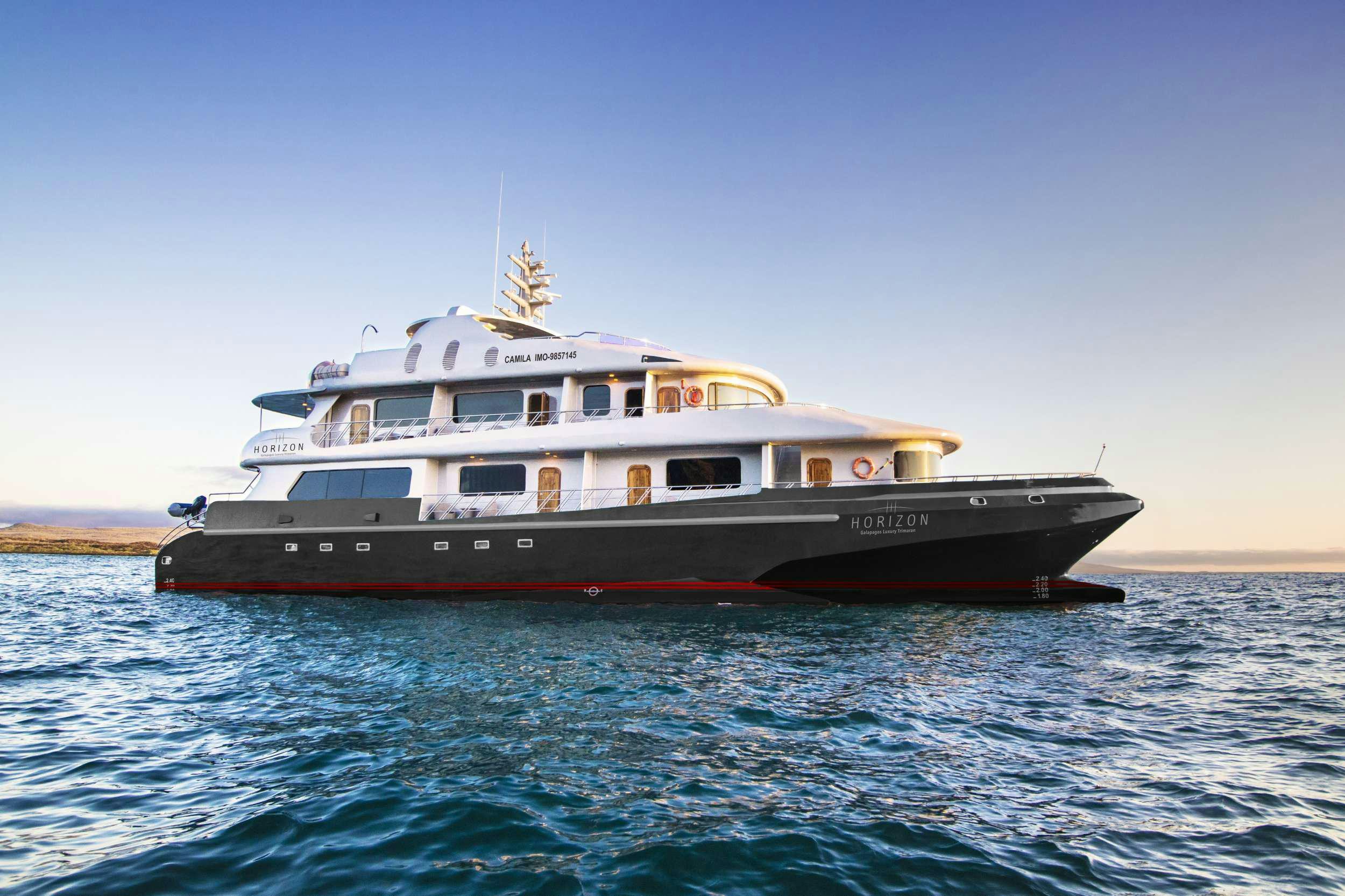 a boat on the water aboard GALAPAGOS HORIZON Yacht for Charter