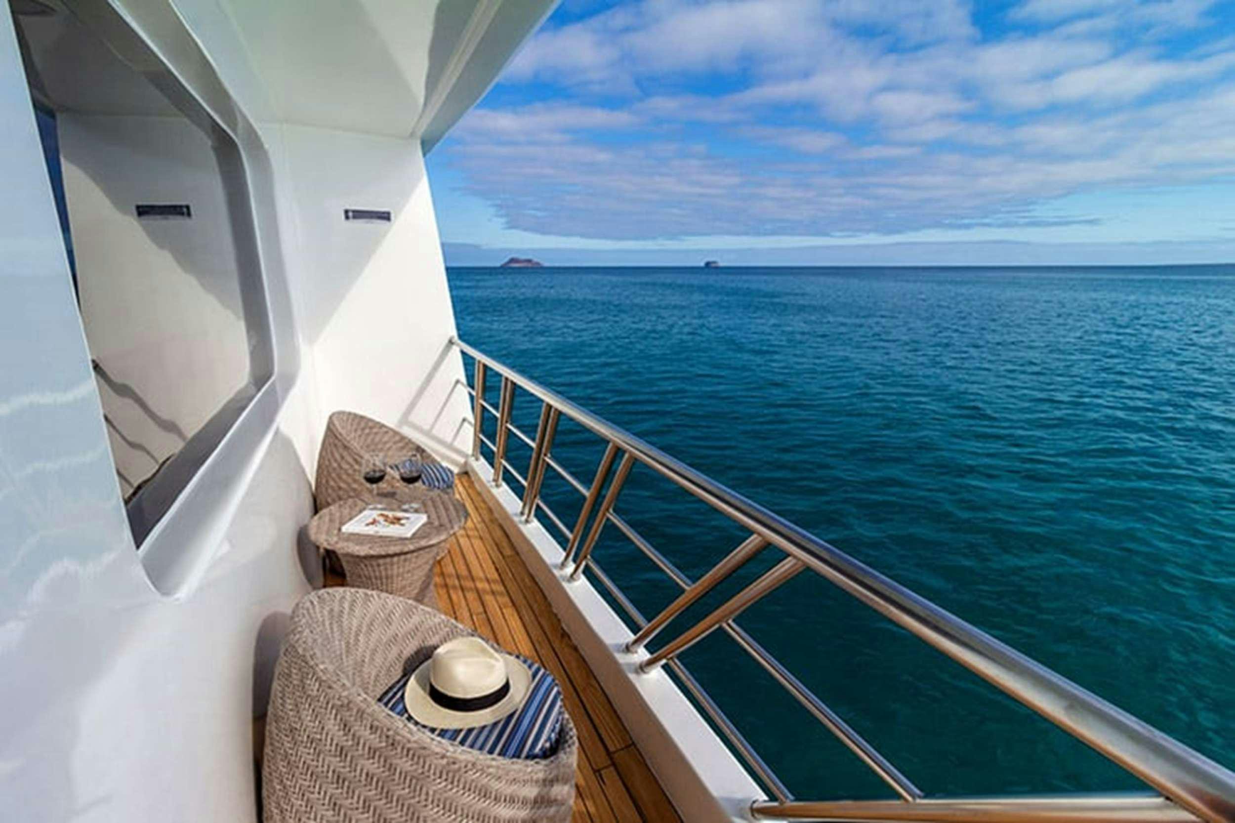 a boat with a hat on it aboard GALAPAGOS HORIZON Yacht for Charter