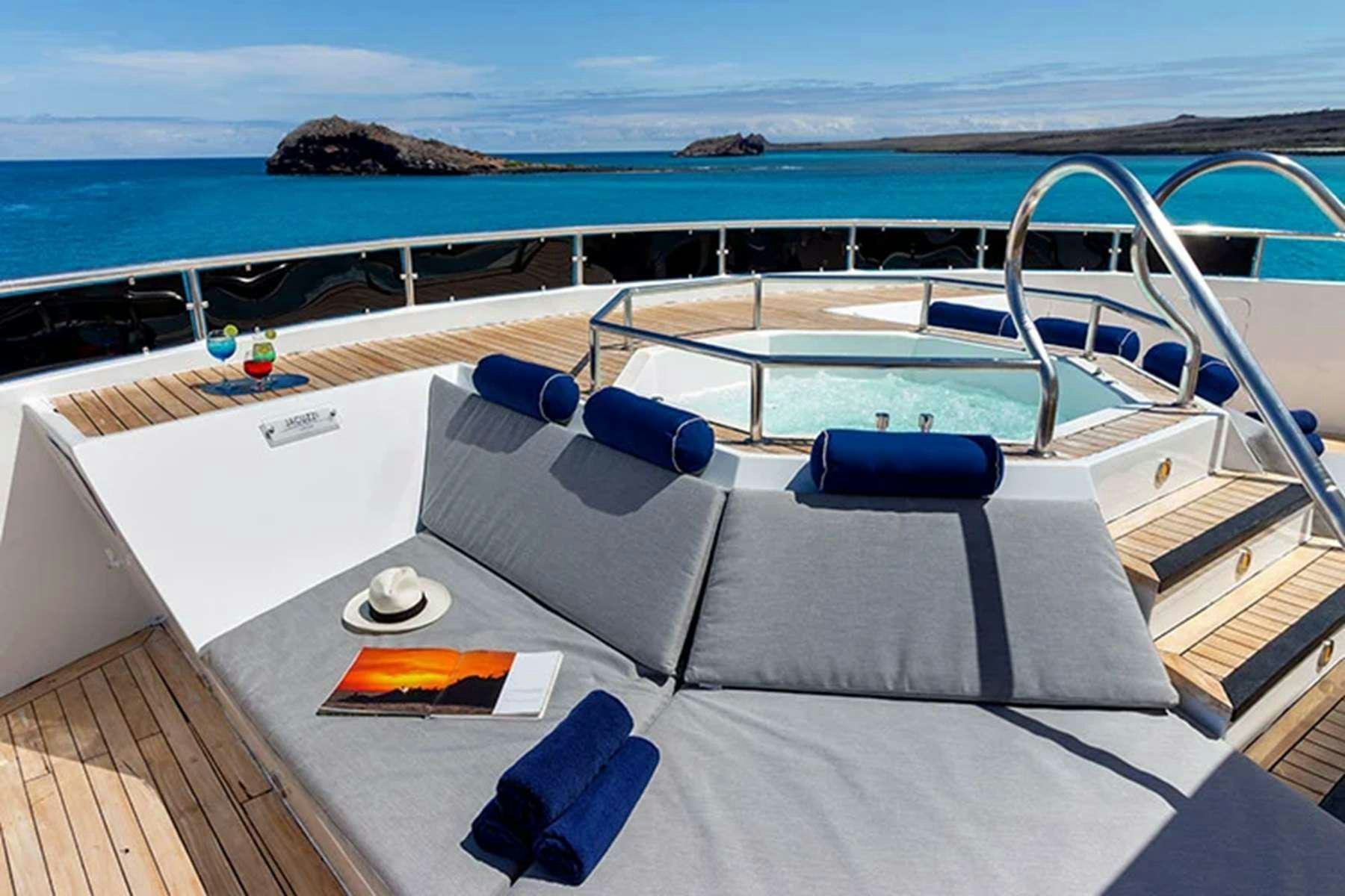 a boat on the water aboard GALAPAGOS HORIZON Yacht for Charter