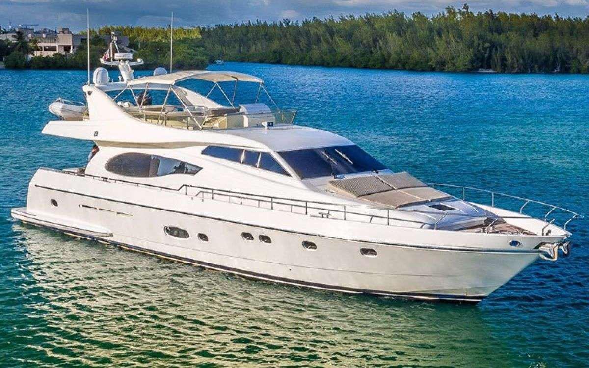 a white yacht on the water aboard HASARD Yacht for Charter