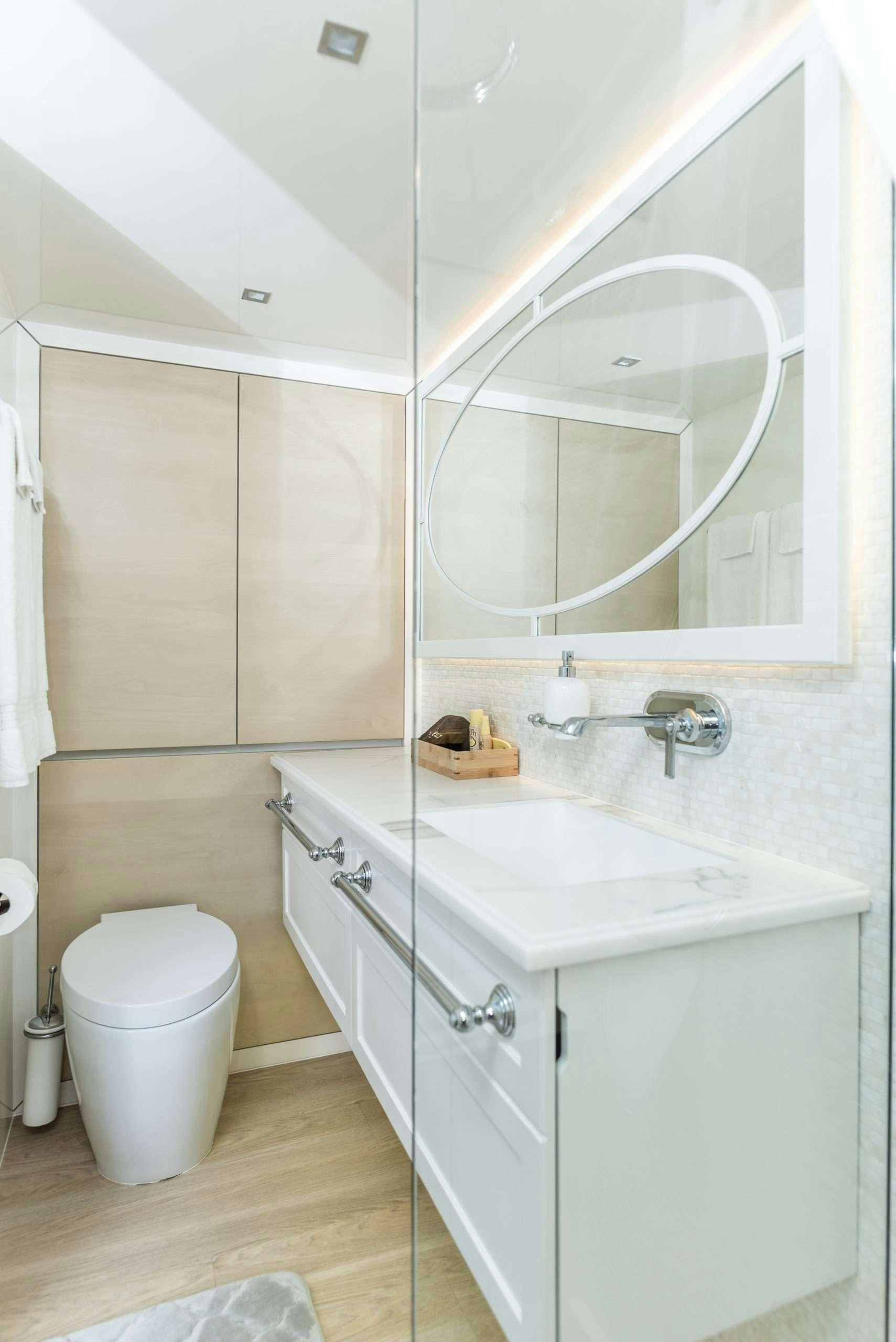 a bathroom with a sink and a mirror aboard BUNDALONG Yacht for Charter