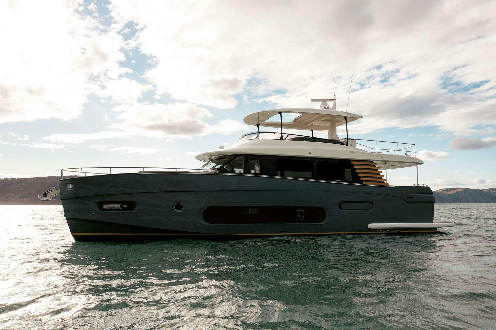 a boat on the water aboard AZIMUT MAGHELLANO 66 Yacht for Charter