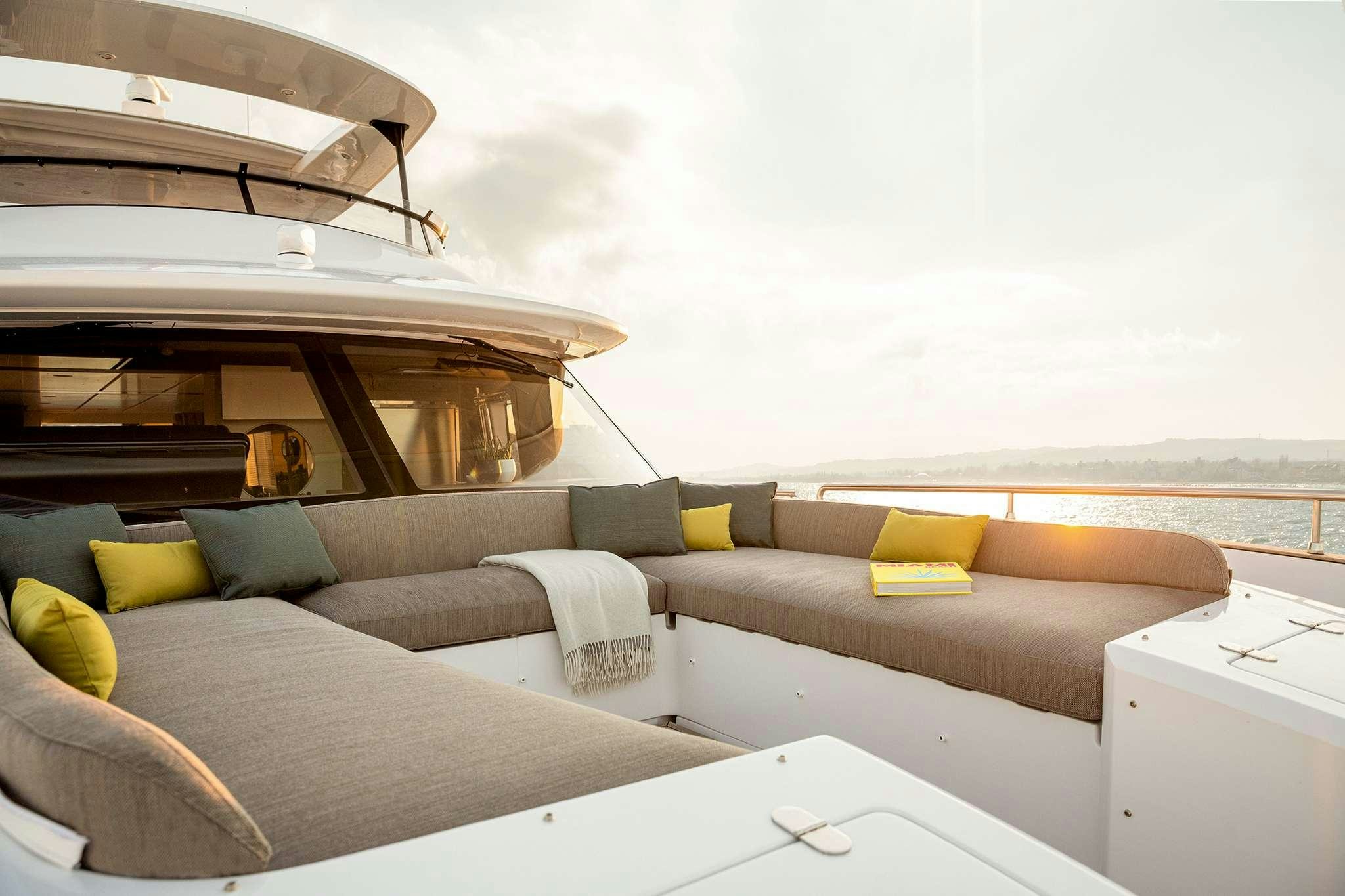 a boat on the water aboard AZIMUT MAGHELLANO 66 Yacht for Charter