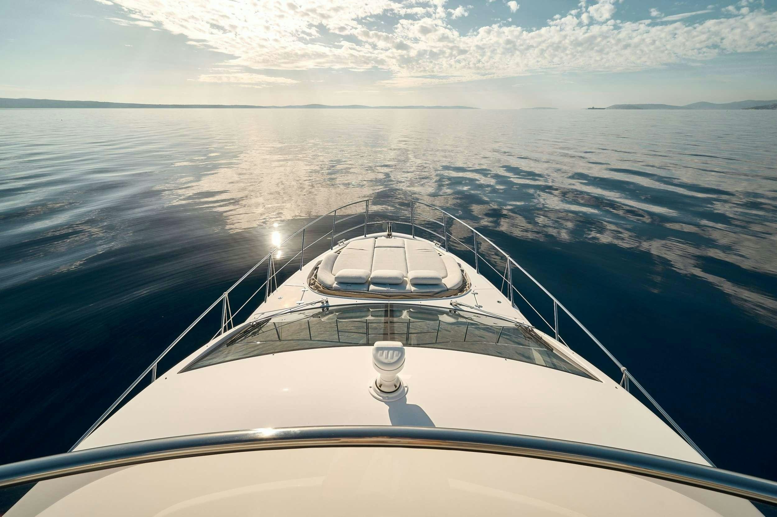 a boat on the water aboard AZIMUT 55 FLY - AMPARITO IV Yacht for Charter