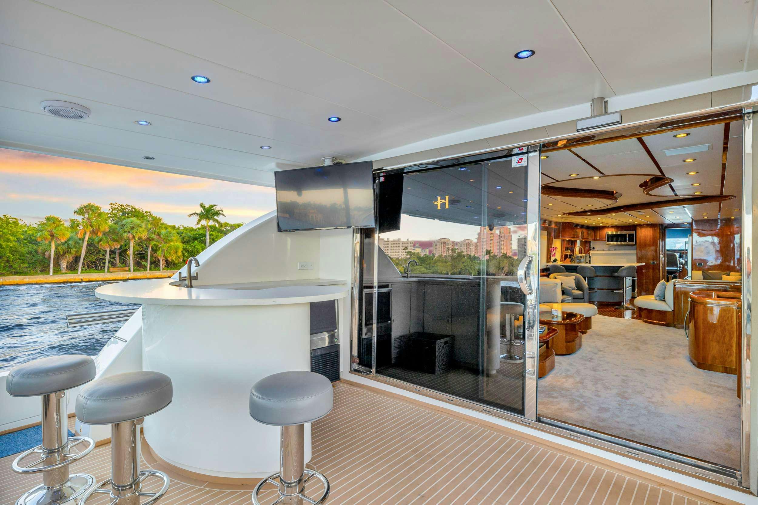 a room with a table and chairs aboard DREAM ON Yacht for Charter