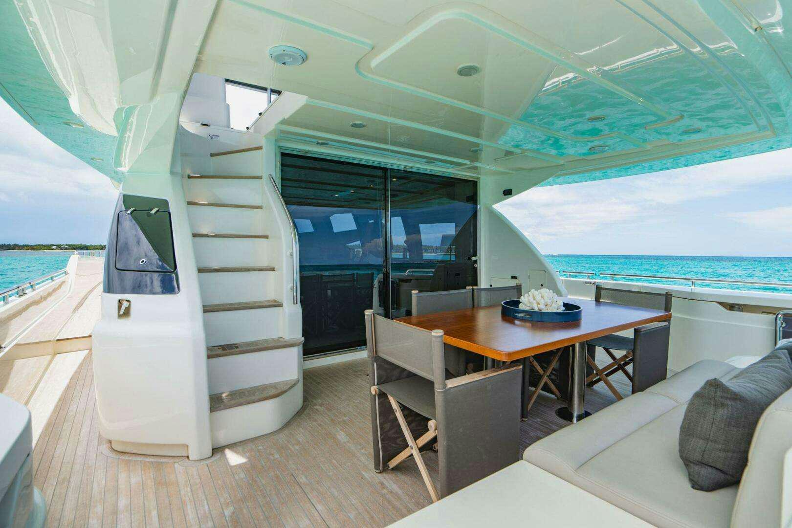 a boat with a ladder aboard BIOHAX Yacht for Charter