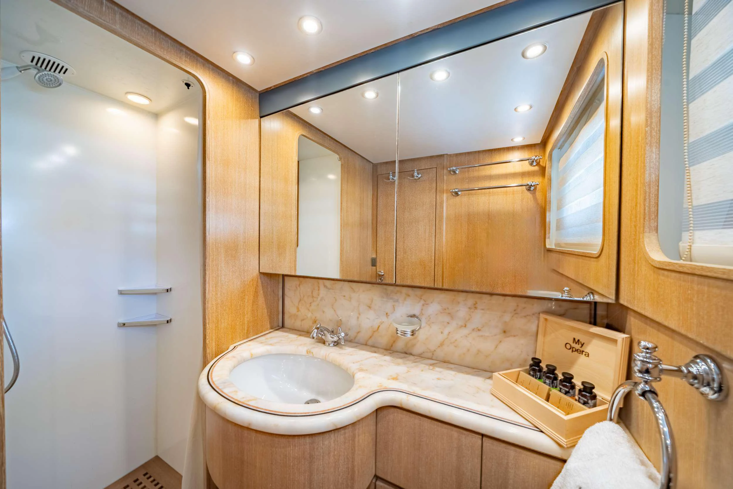 a bathroom with a large bathtub aboard OPERA Yacht for Charter