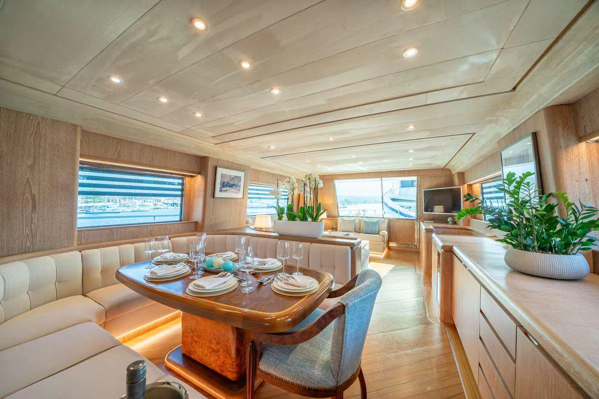 a large kitchen and dining room aboard OPERA Yacht for Charter