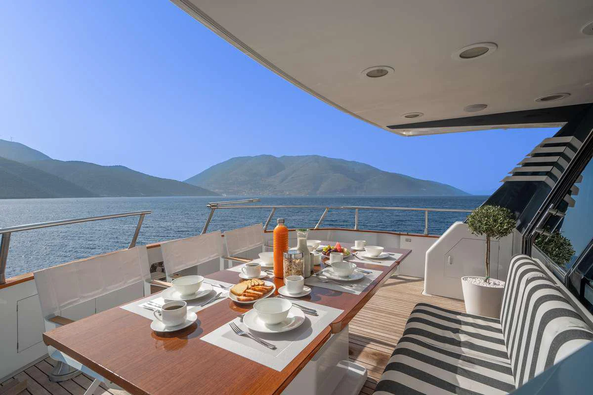 a table on a boat aboard OPERA Yacht for Charter