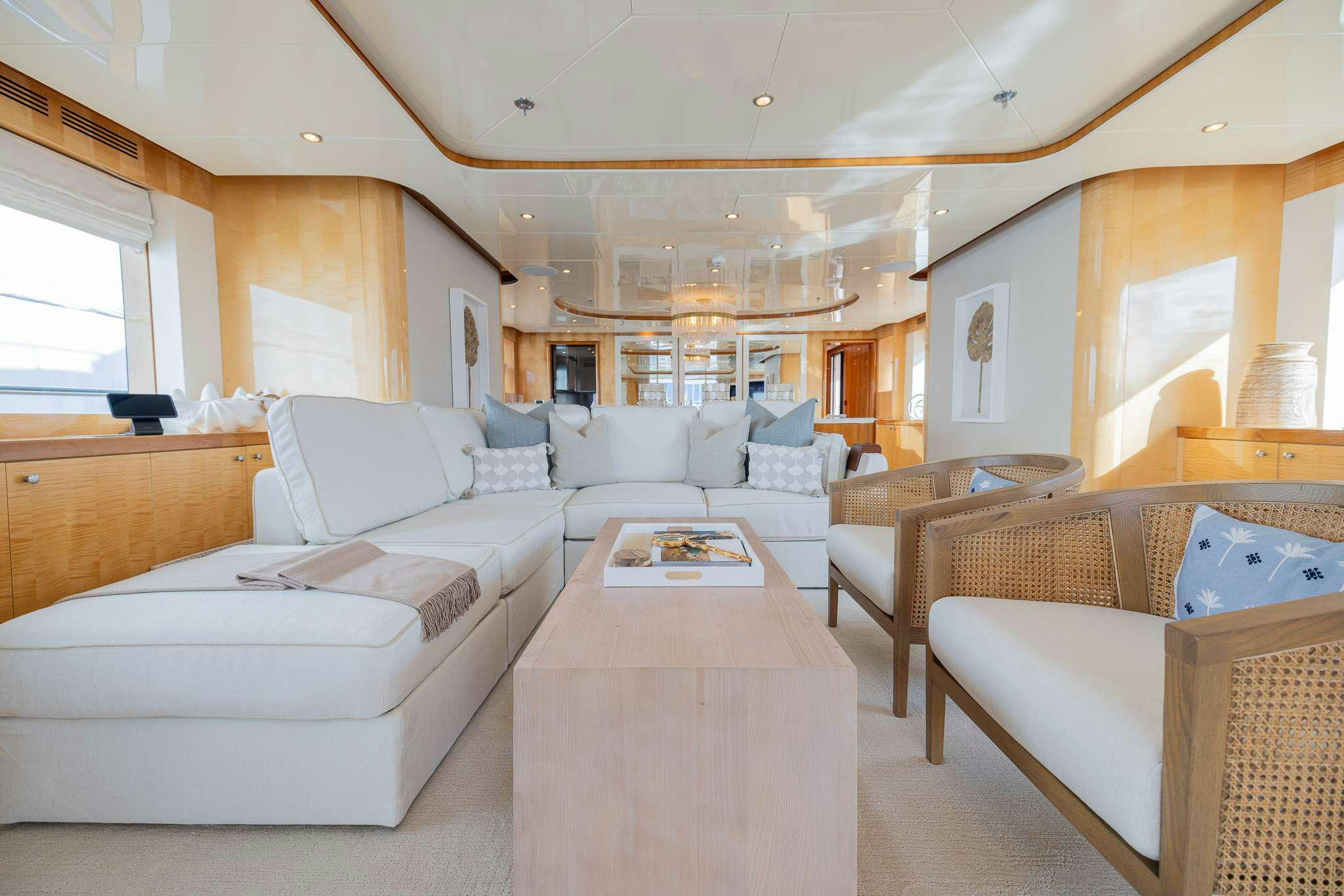 a living room with a large mirror aboard STAY SALTY Yacht for Charter