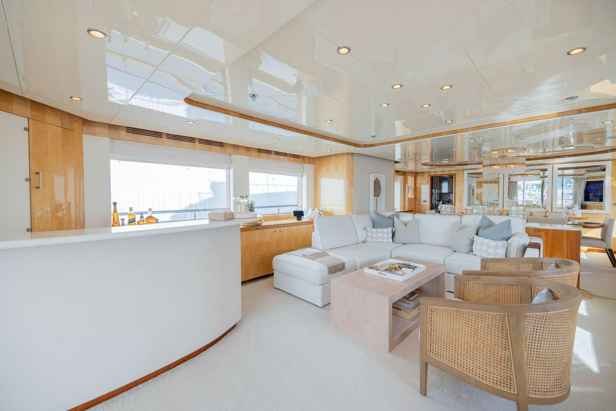 a living room with a large window aboard STAY SALTY Yacht for Charter