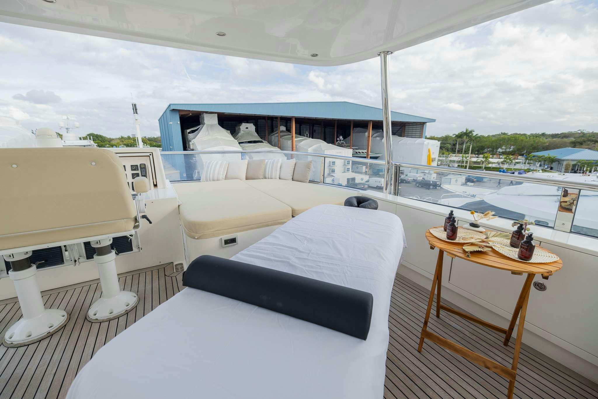 a room with a table and chairs aboard STAY SALTY Yacht for Charter