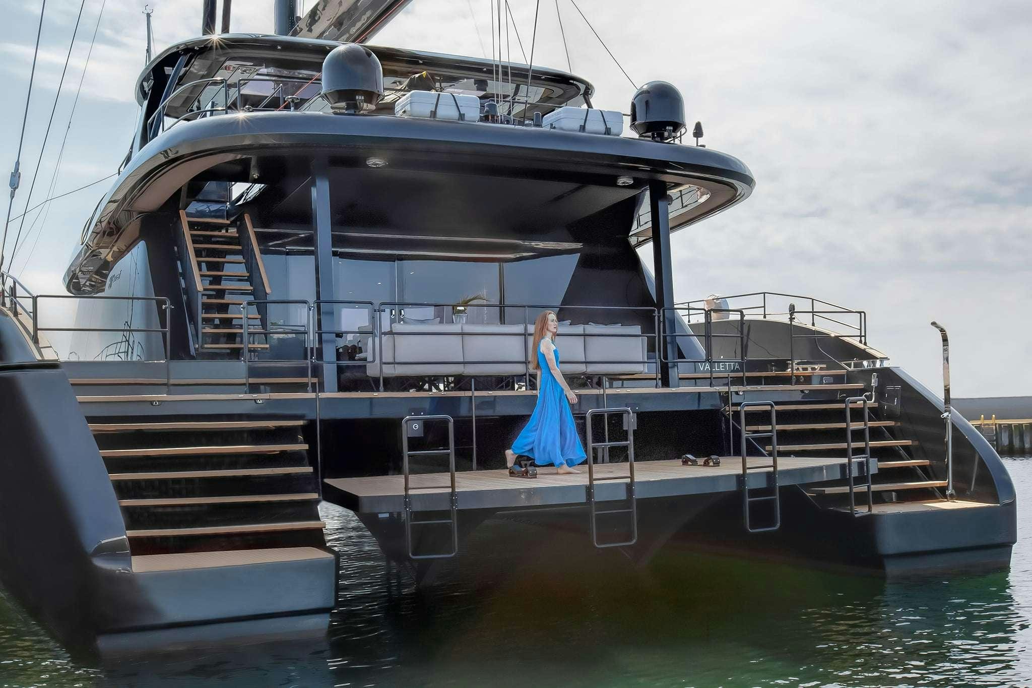 a boat with a blue dress on it aboard HALCYON Yacht for Charter