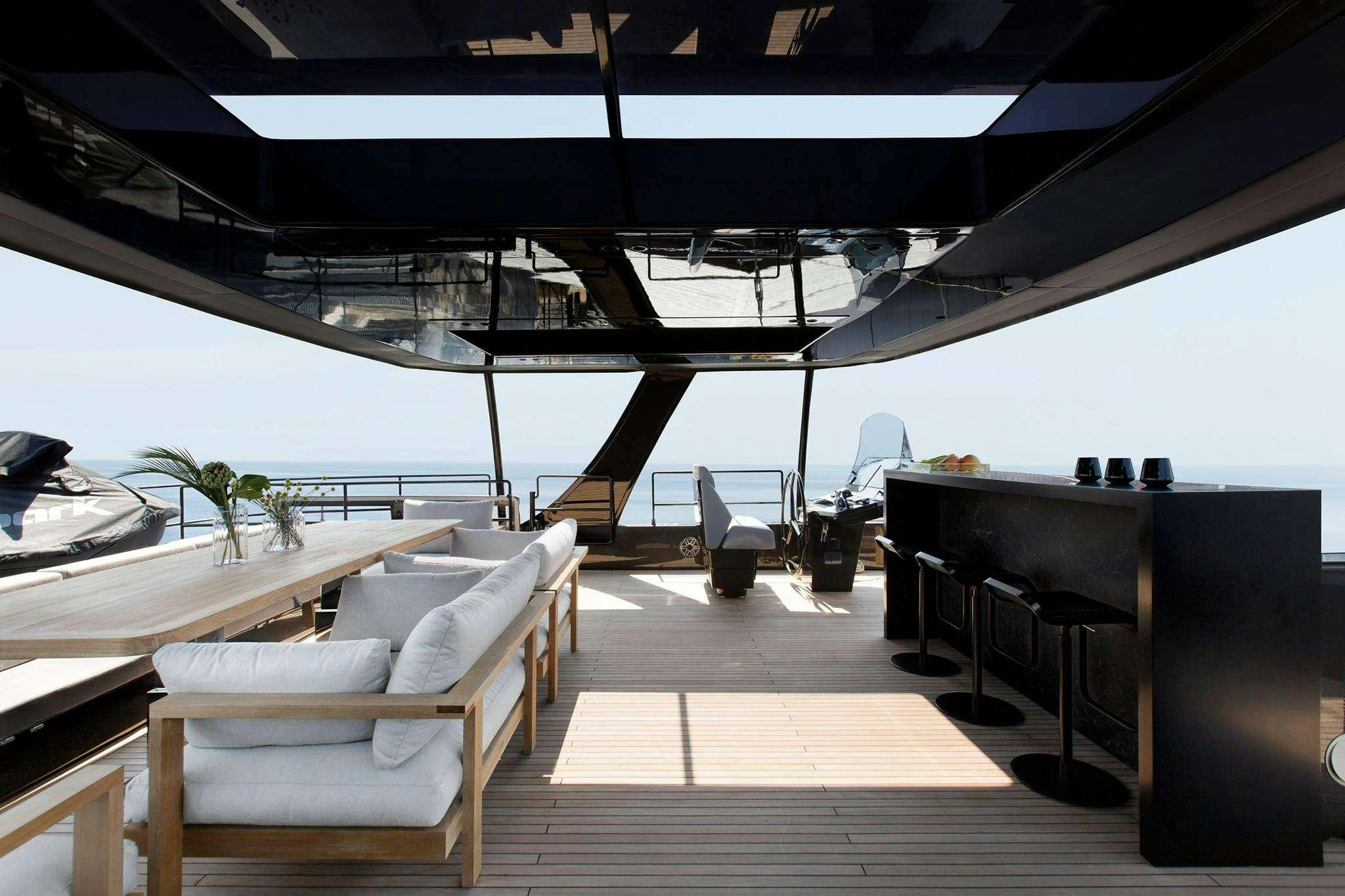 a room with a table and chairs aboard HALCYON Yacht for Charter