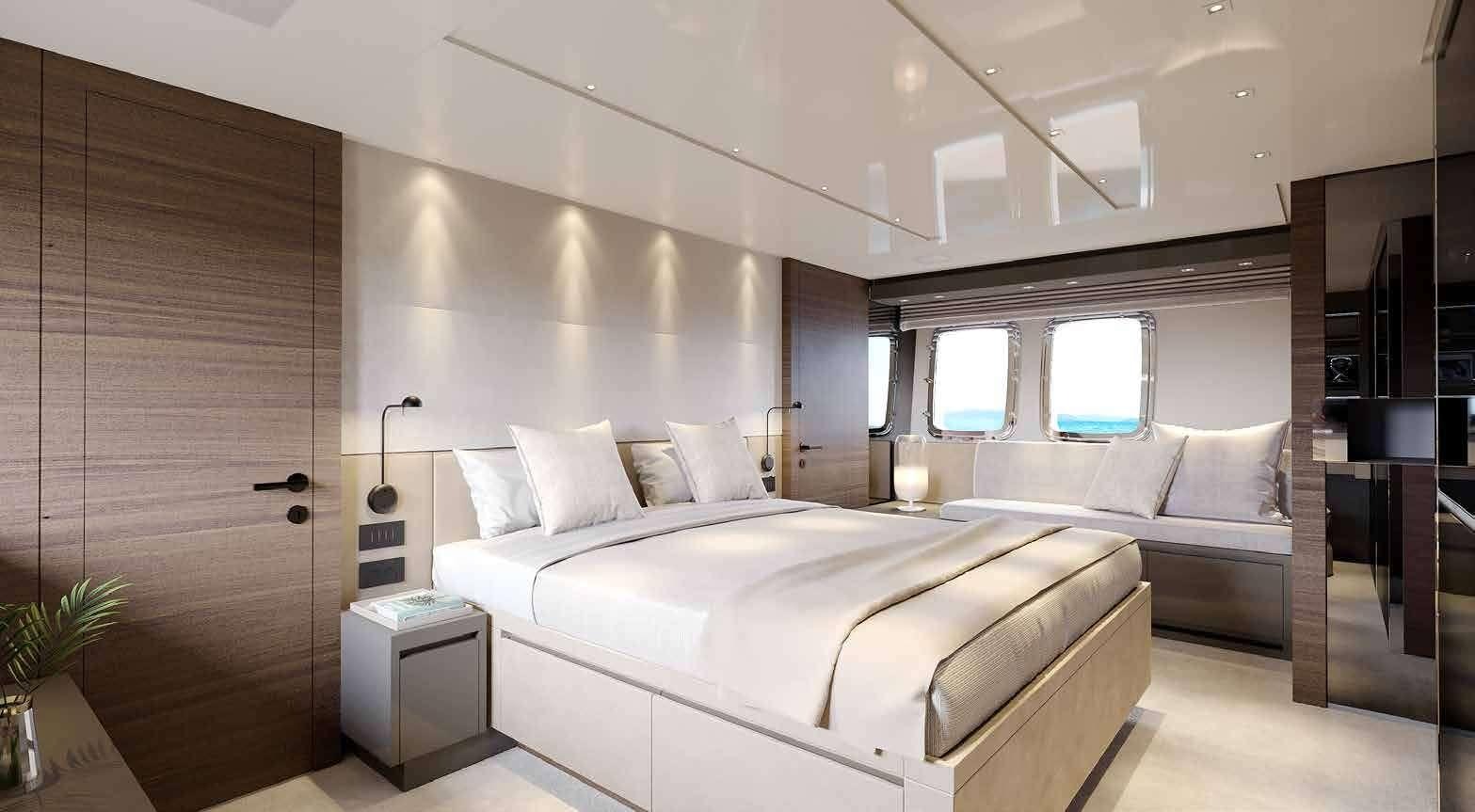 a room with a bed and a window aboard ASTRIMARE Yacht for Charter