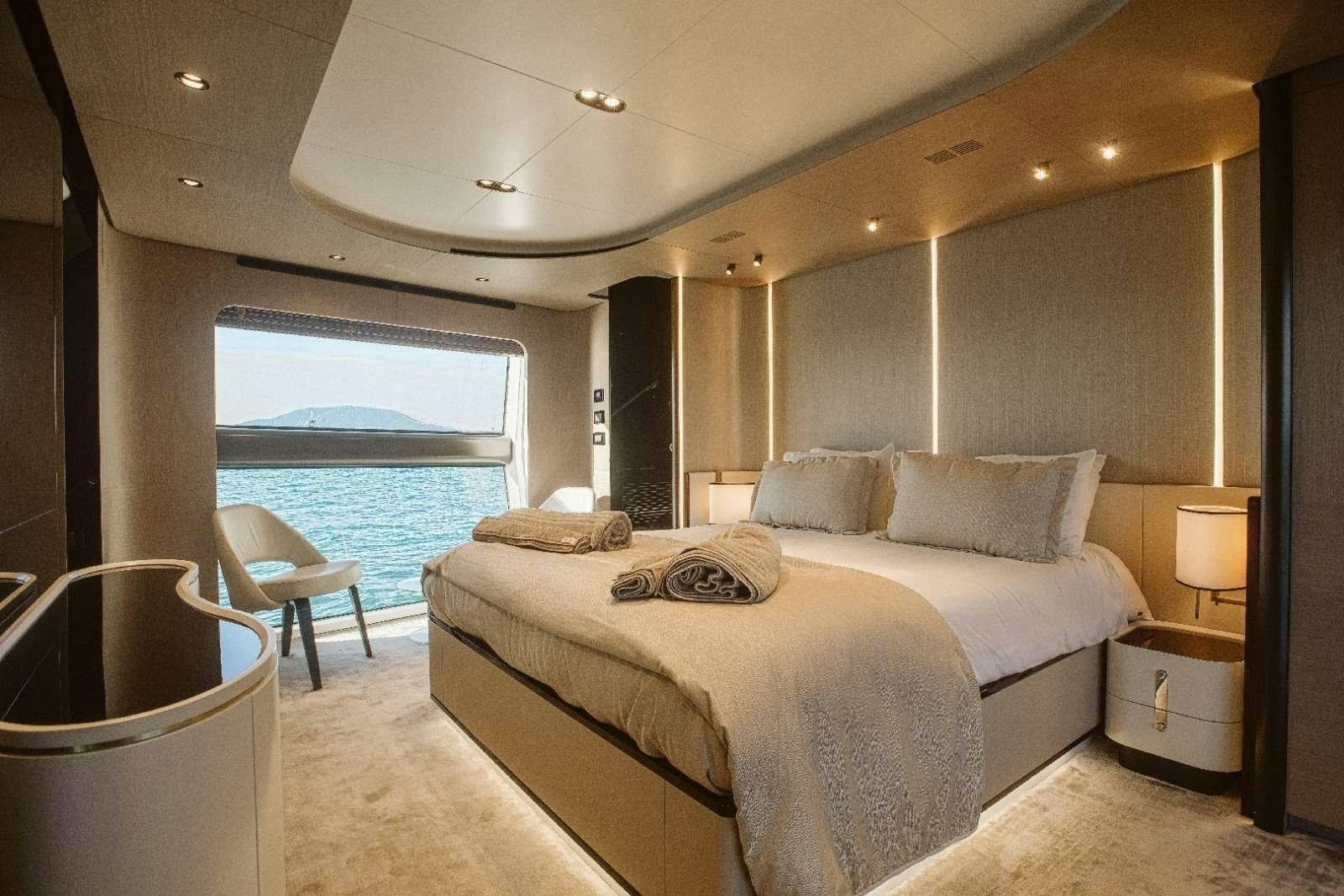 a bed in a room aboard AGIO Yacht for Charter