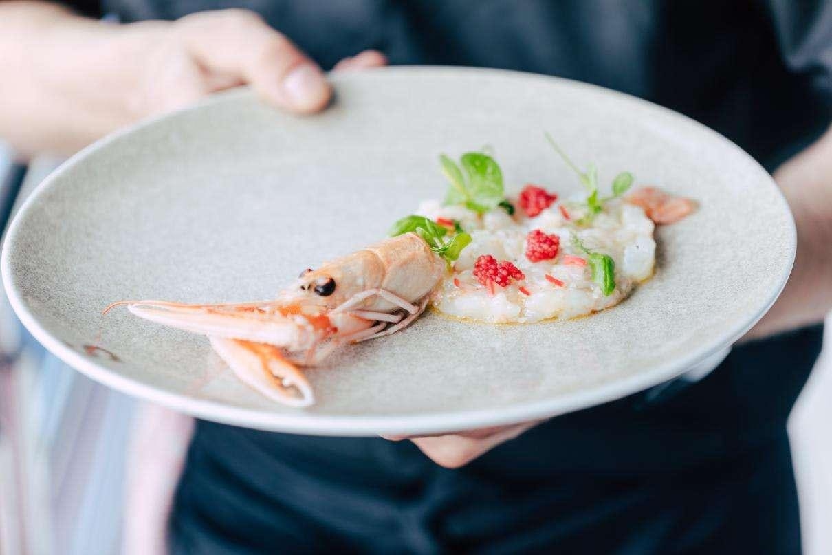 a plate of food aboard SYMPHONY Yacht for Charter