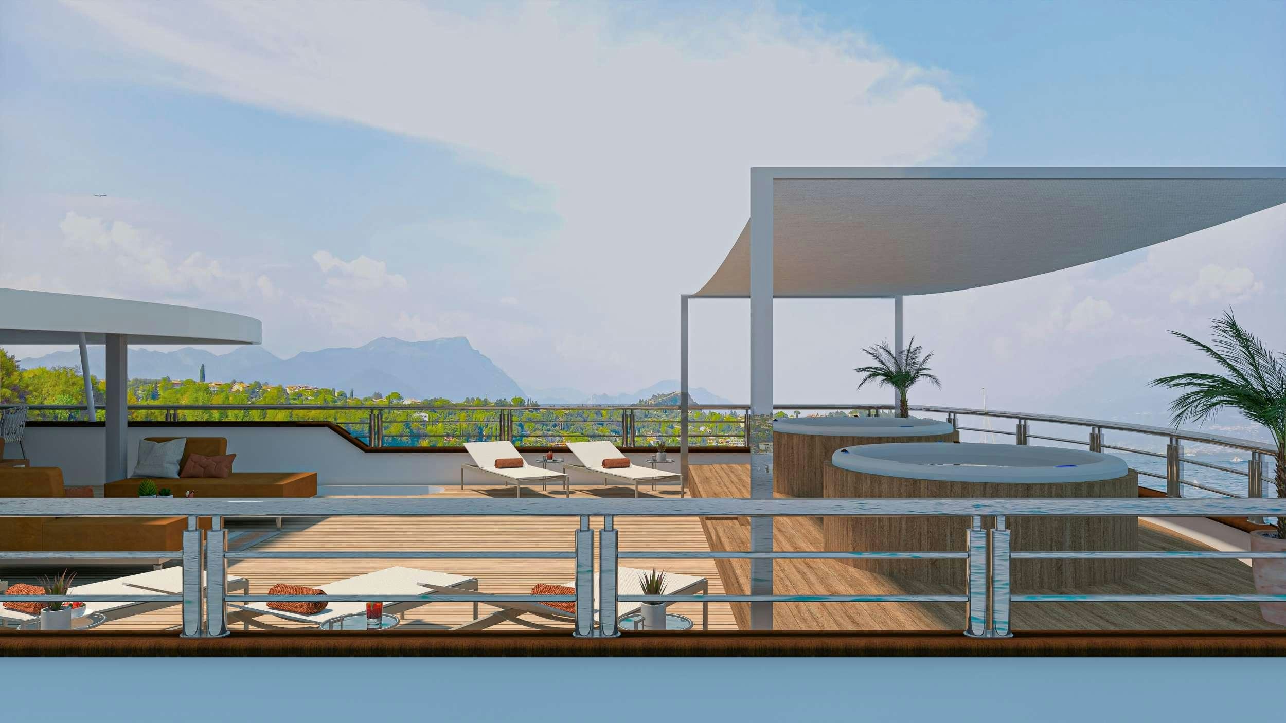 a swimming pool with a deck and a view of mountains aboard ARETHA Yacht for Charter