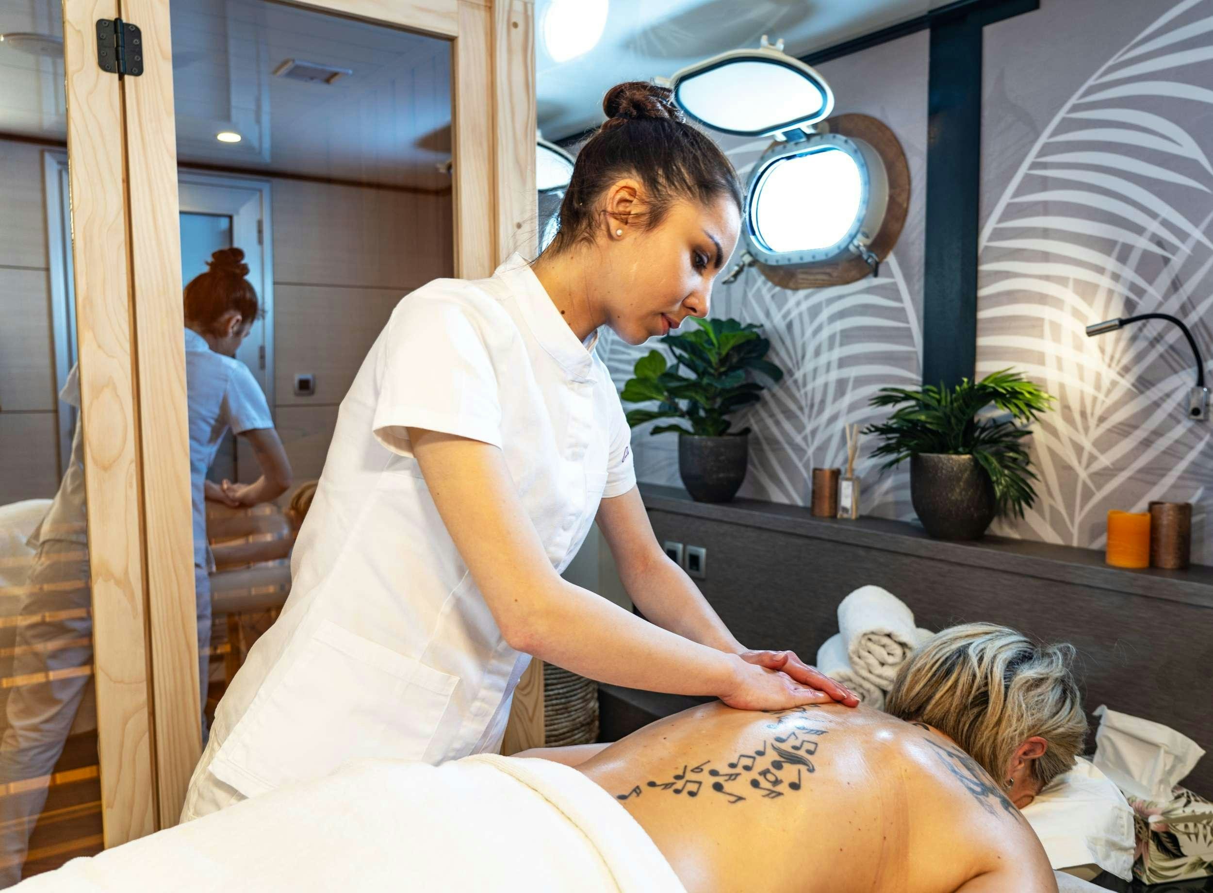 a person getting a bath aboard ARETHA Yacht for Charter