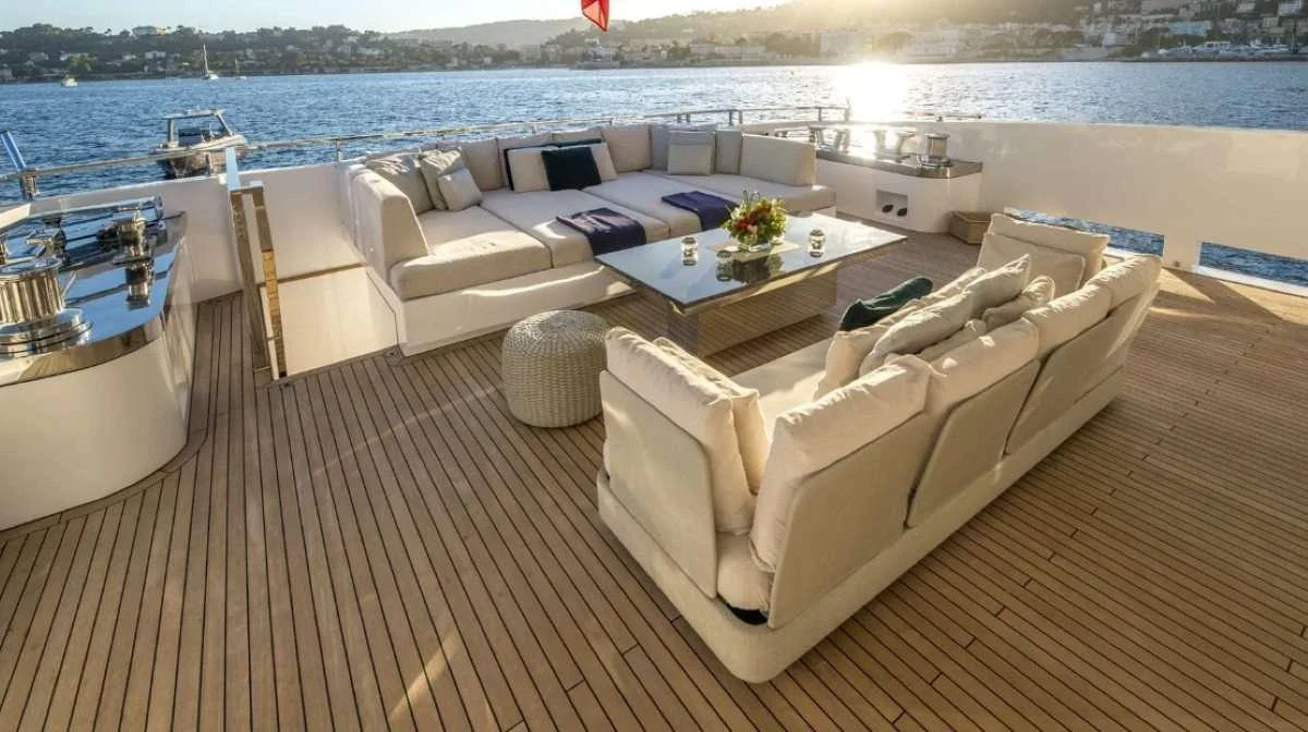 a living room with a couch and a table aboard AXIOS Yacht for Charter