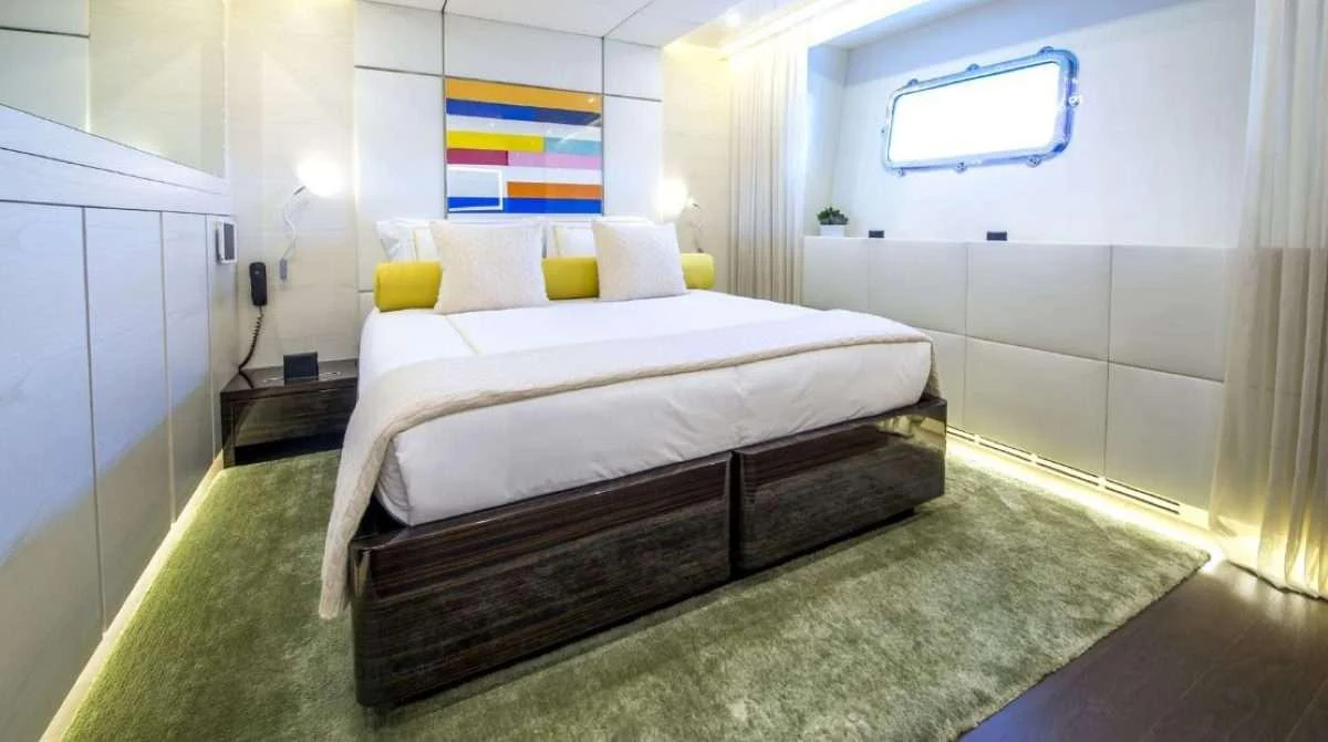 a bed in a room aboard AXIOS Yacht for Charter