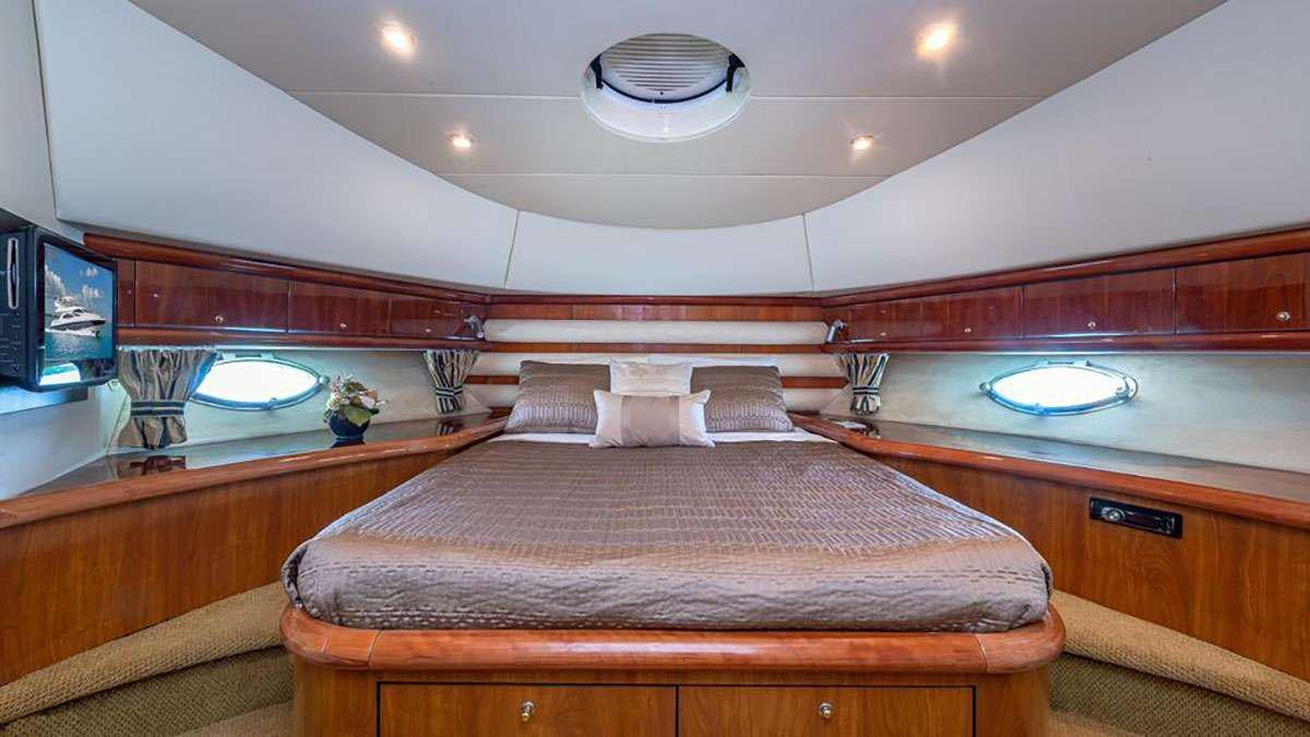 a bed in a room aboard GIULI Yacht for Charter
