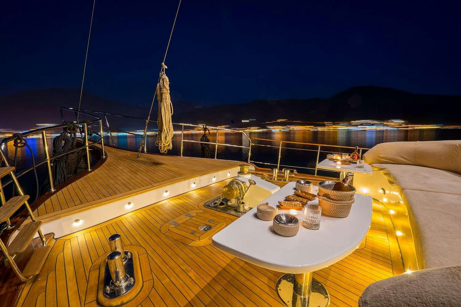 a balcony overlooking a city aboard HAPPY DAYS Yacht for Charter
