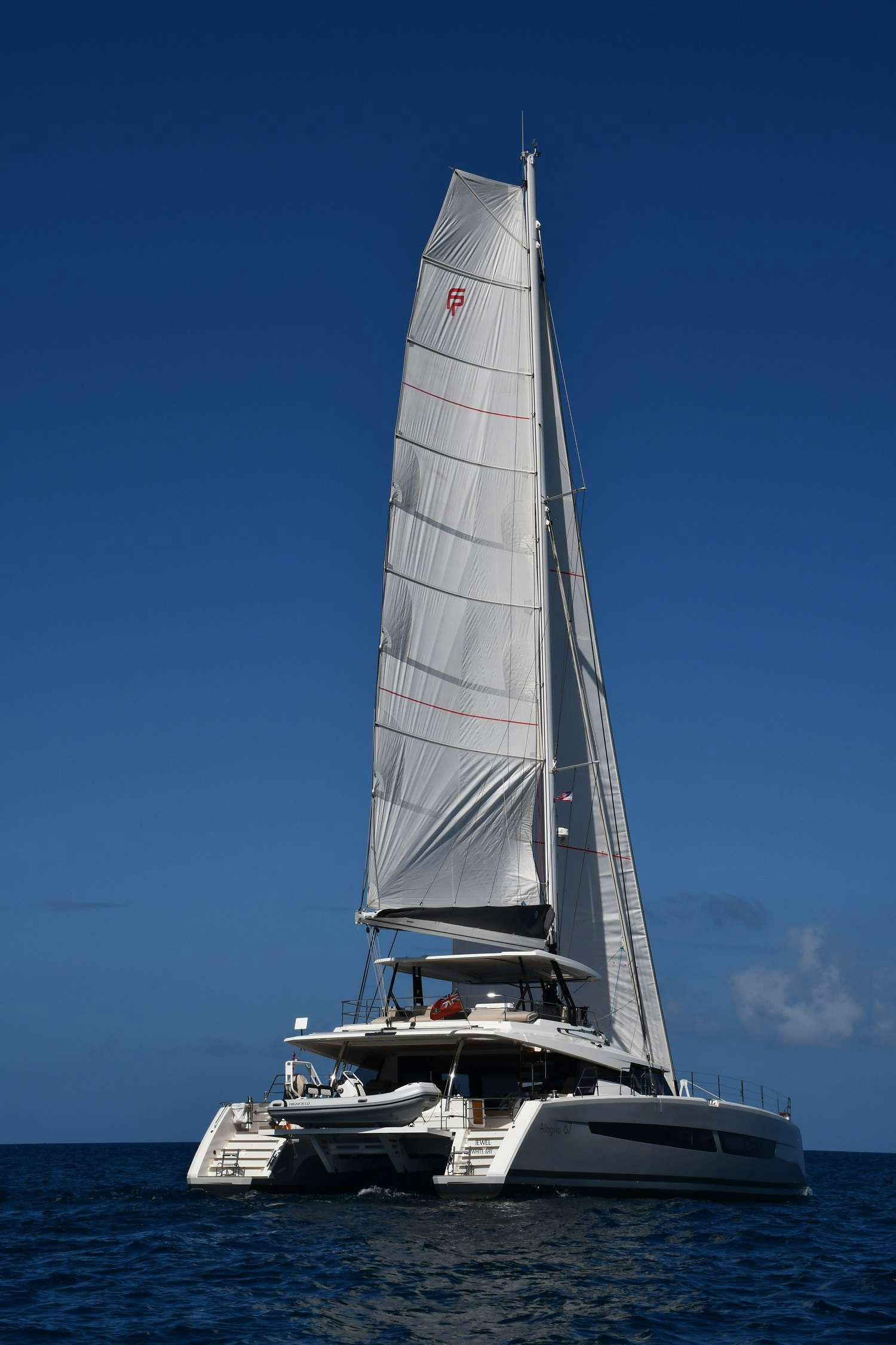 a sailboat on the water aboard JEWEL Yacht for Charter