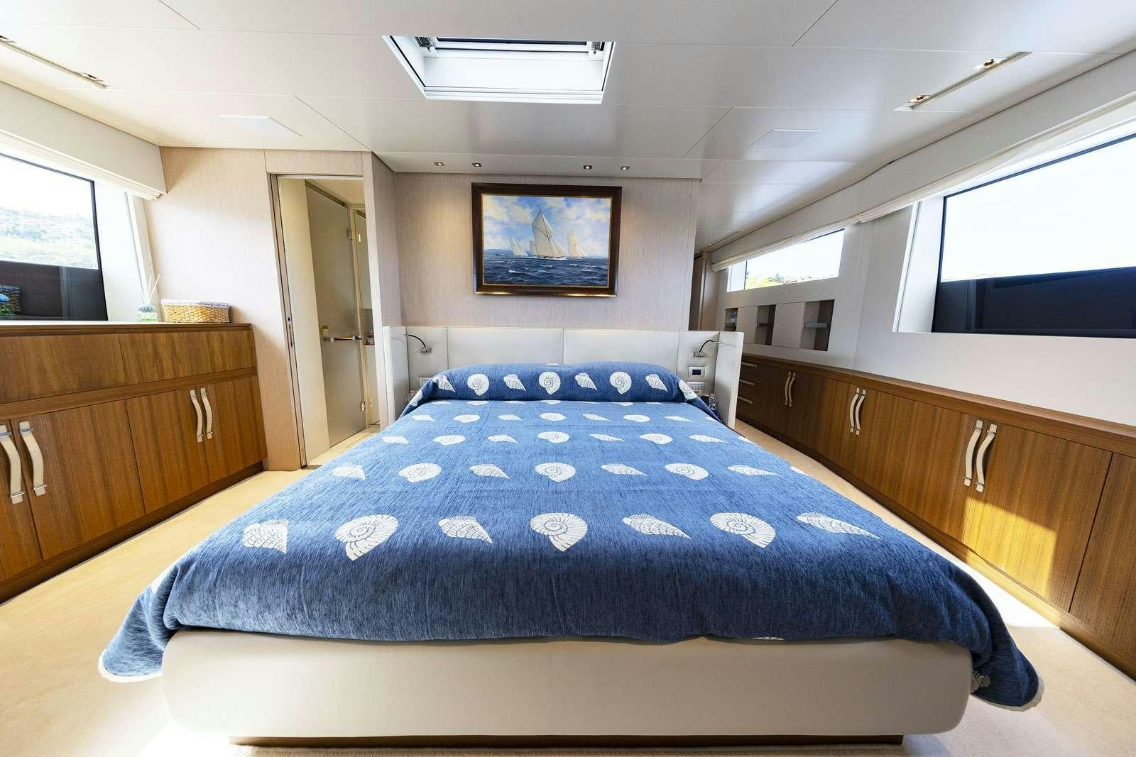 a bed in a room aboard VITTORIA Yacht for Charter