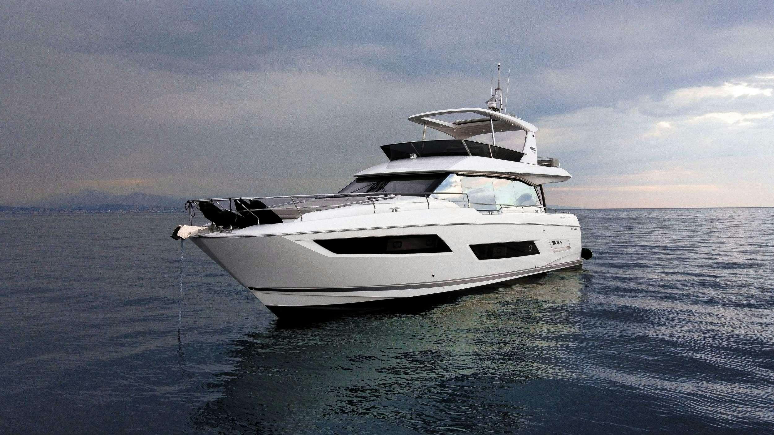 a white yacht in the water aboard ROMY ONE Yacht for Charter