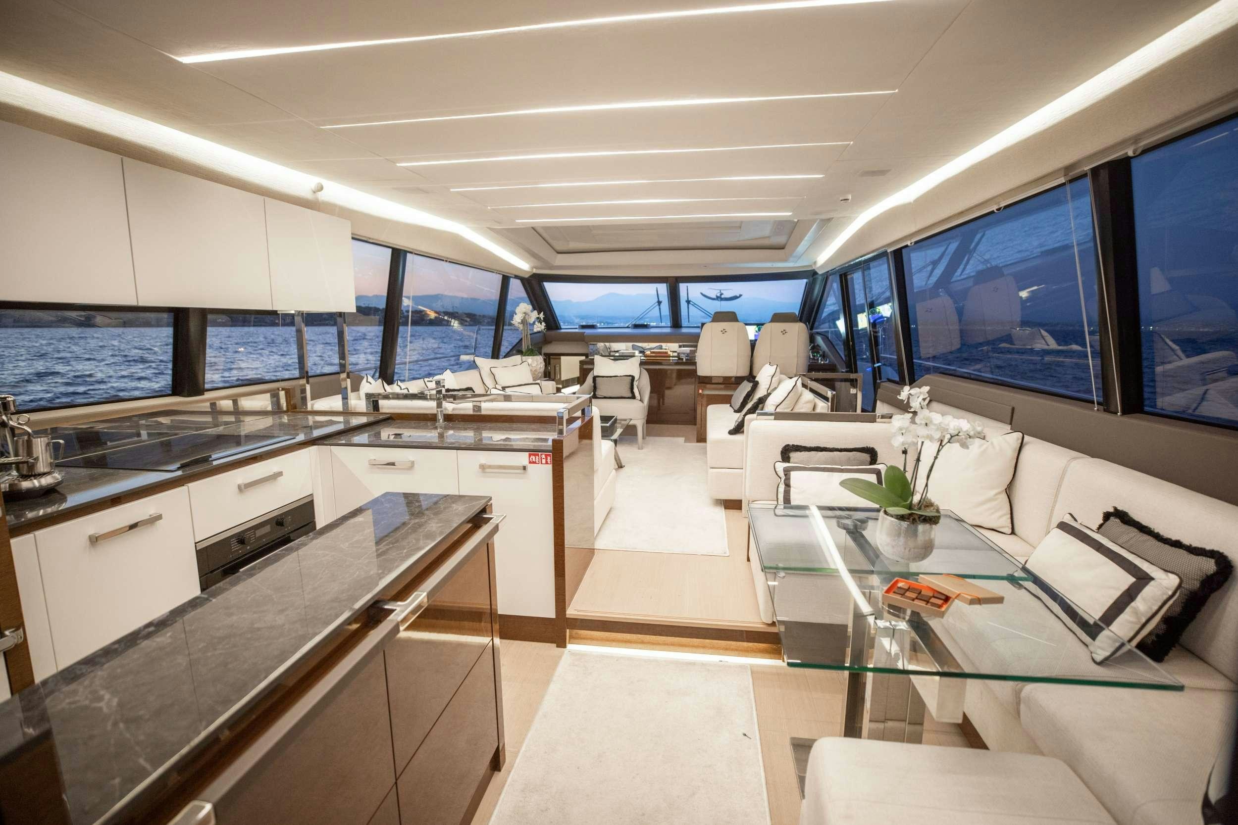 a large kitchen with a large window aboard ROMY ONE Yacht for Charter