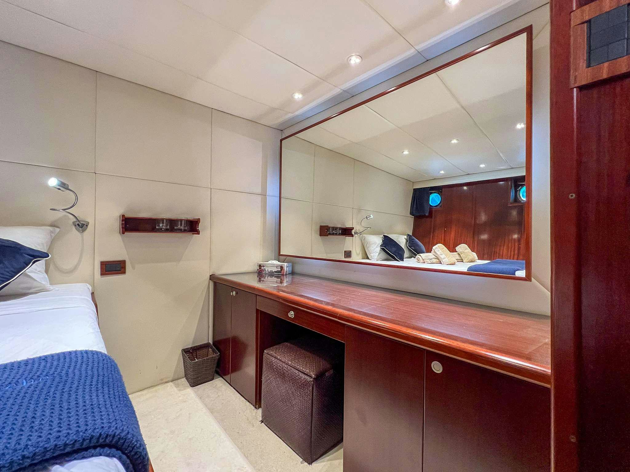 a bathroom with a large mirror aboard APHRODITE Yacht for Charter