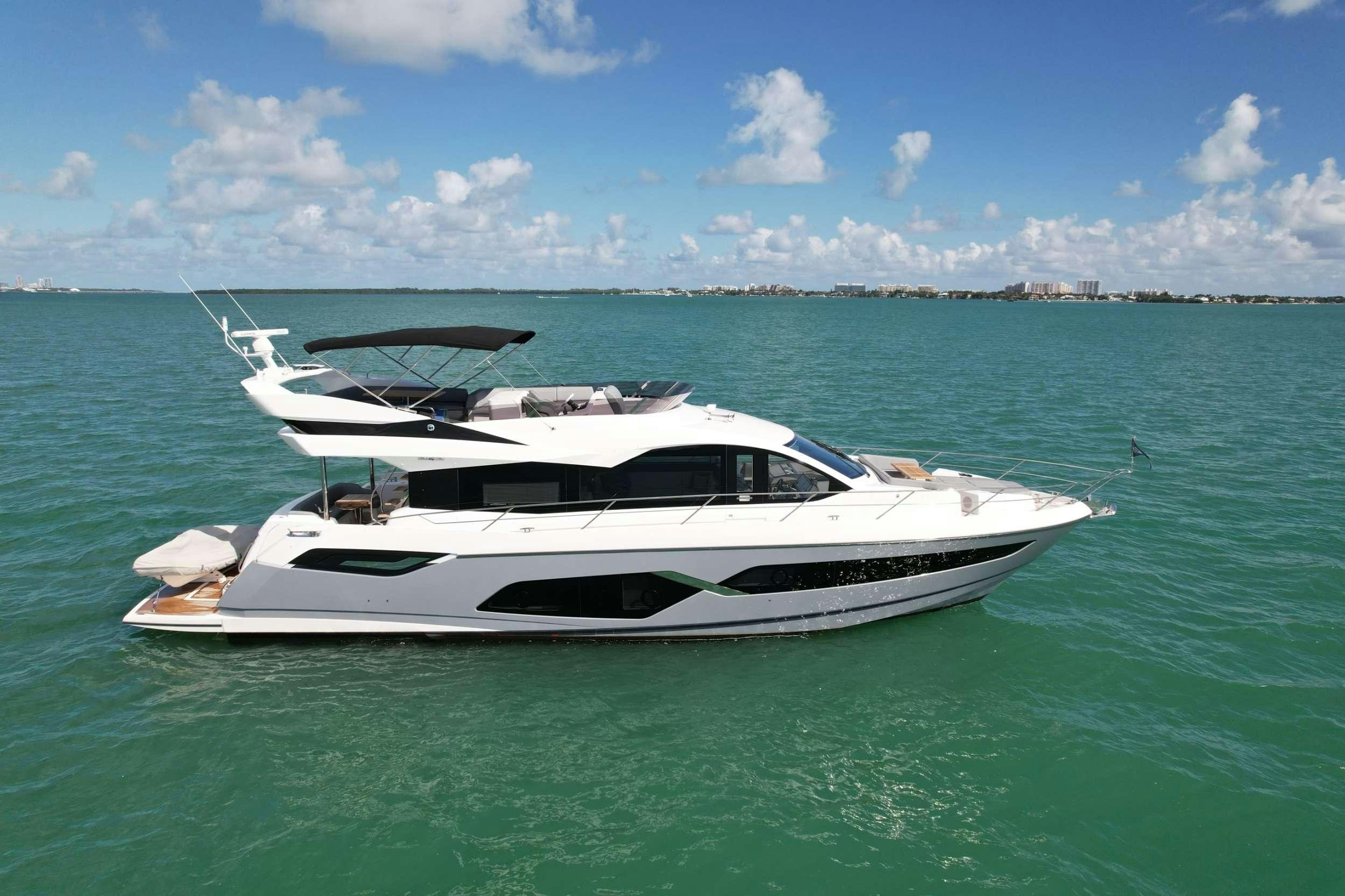 a white boat in the water aboard EARL GREY Yacht for Charter
