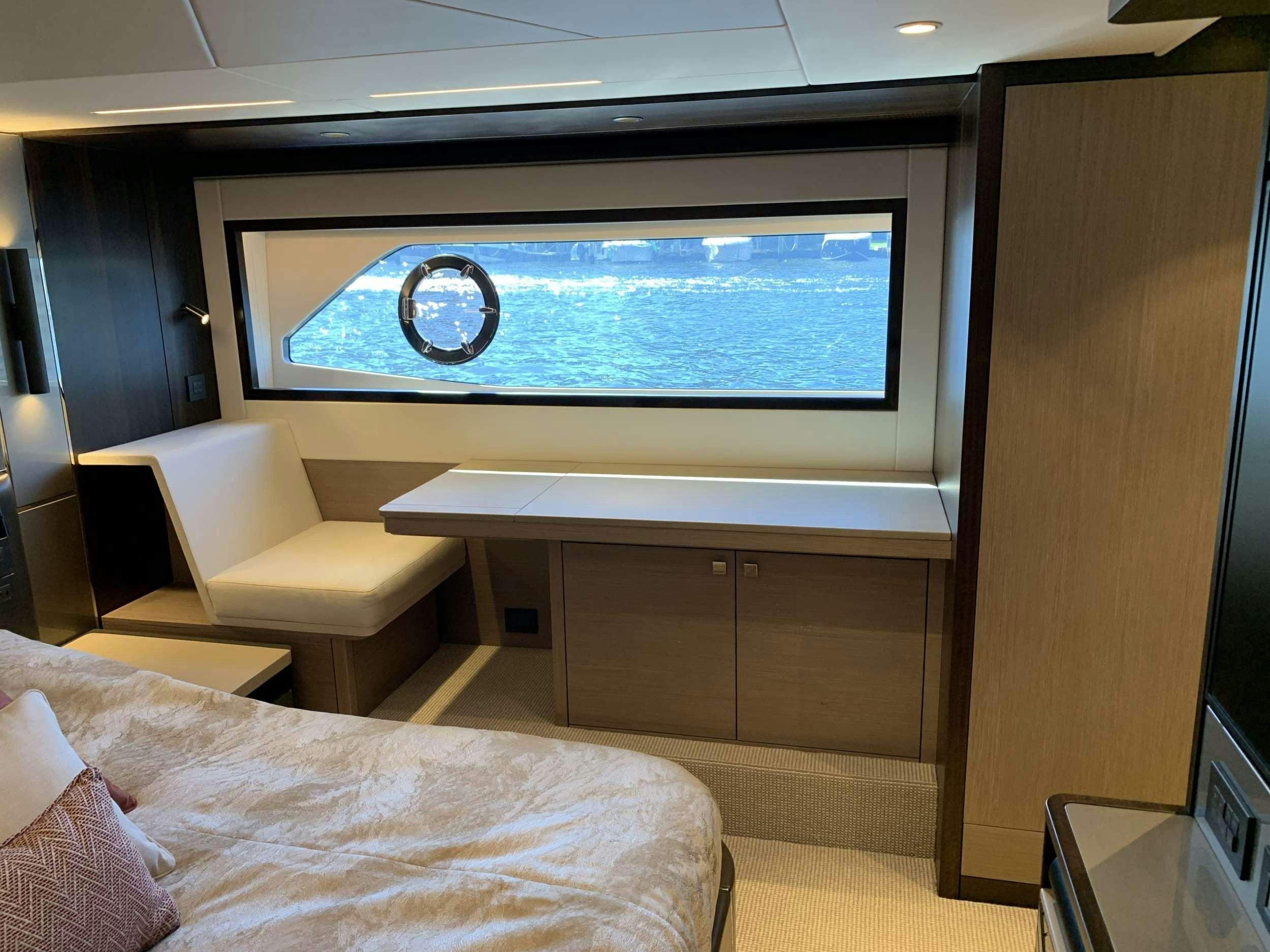 a room with a large screen aboard EARL GREY Yacht for Charter